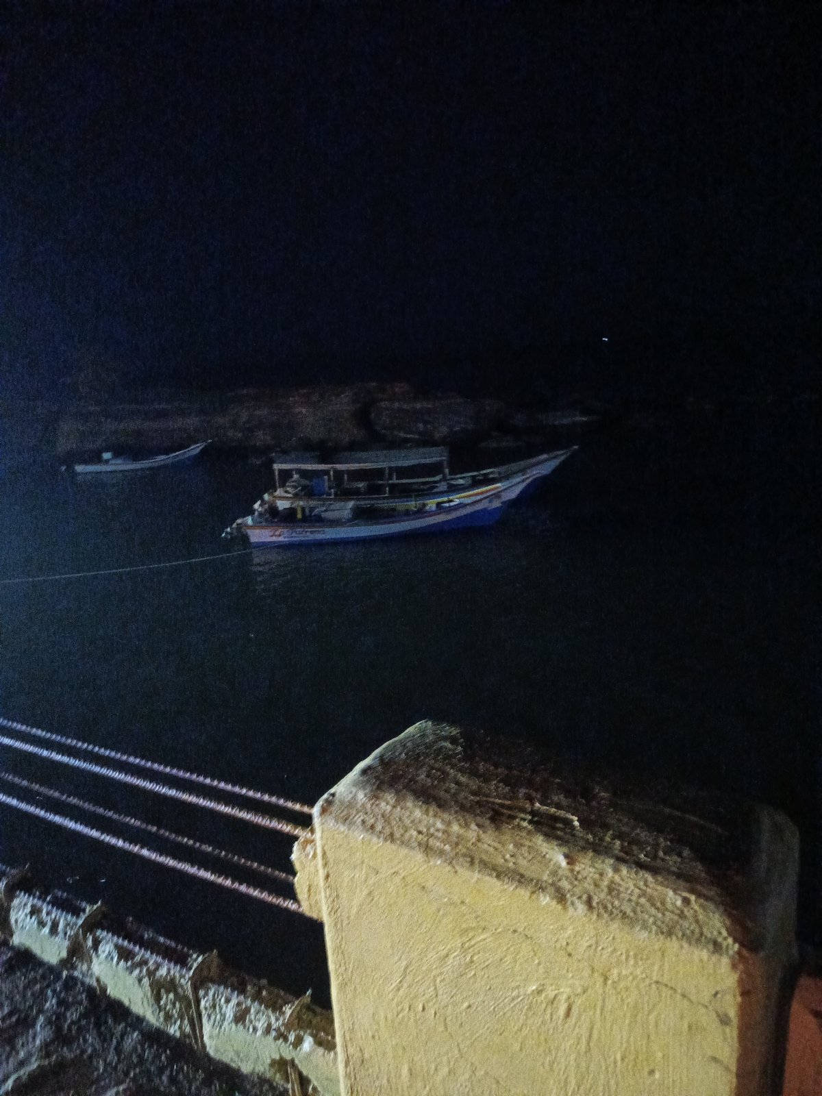 Nighttime waterfront scenes captured in Juan Griego, Venezuela bay area