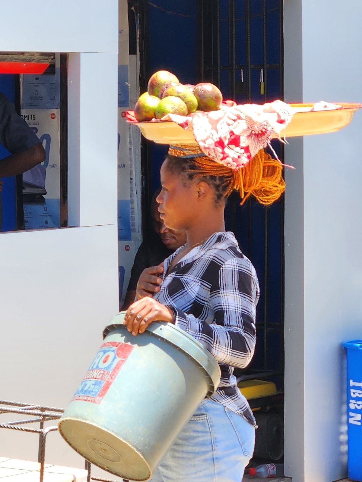 Daily life unfolds across Jos markets and streets