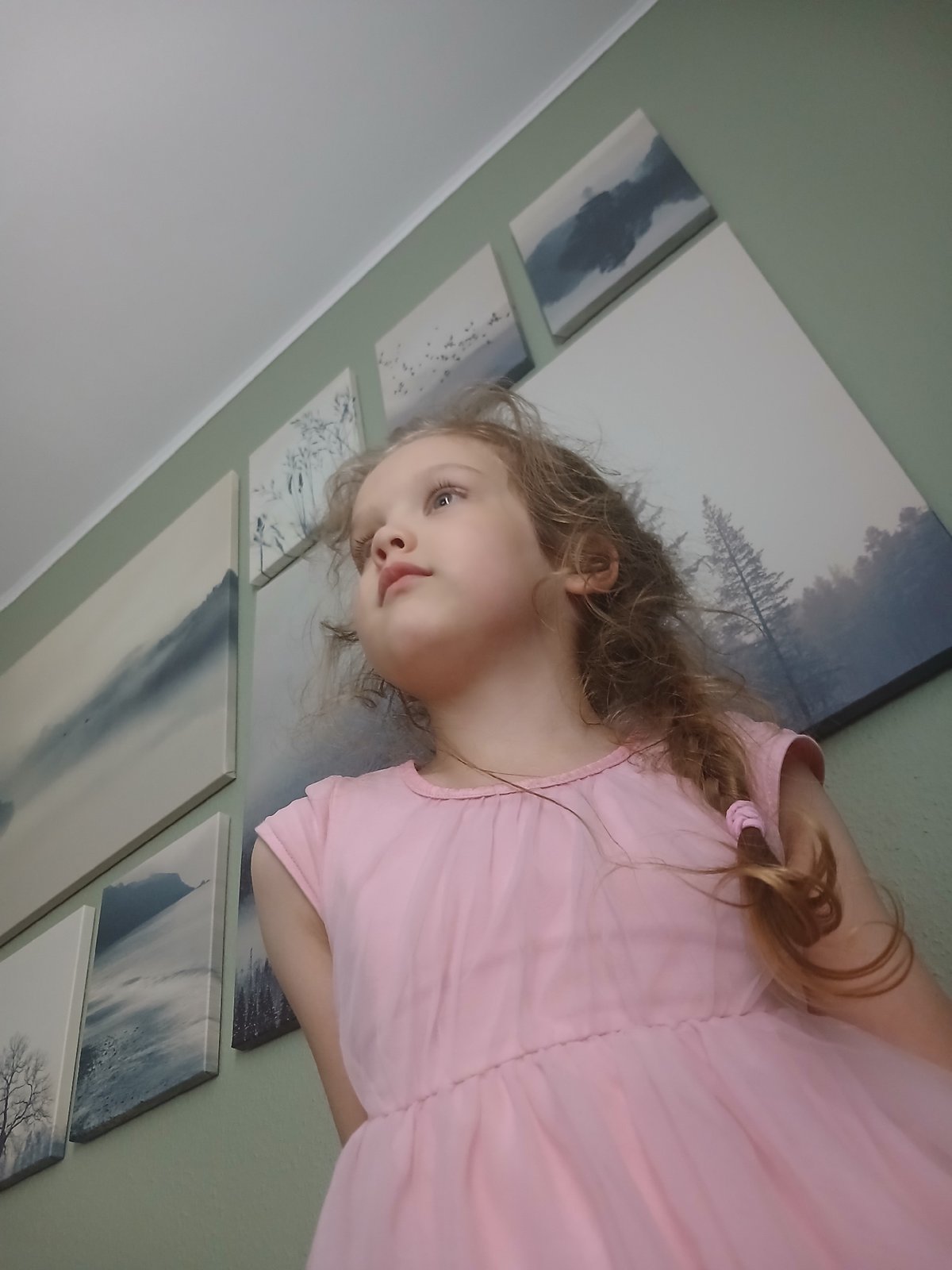 Child plays indoors during heavy flooding in Yekaterinburg