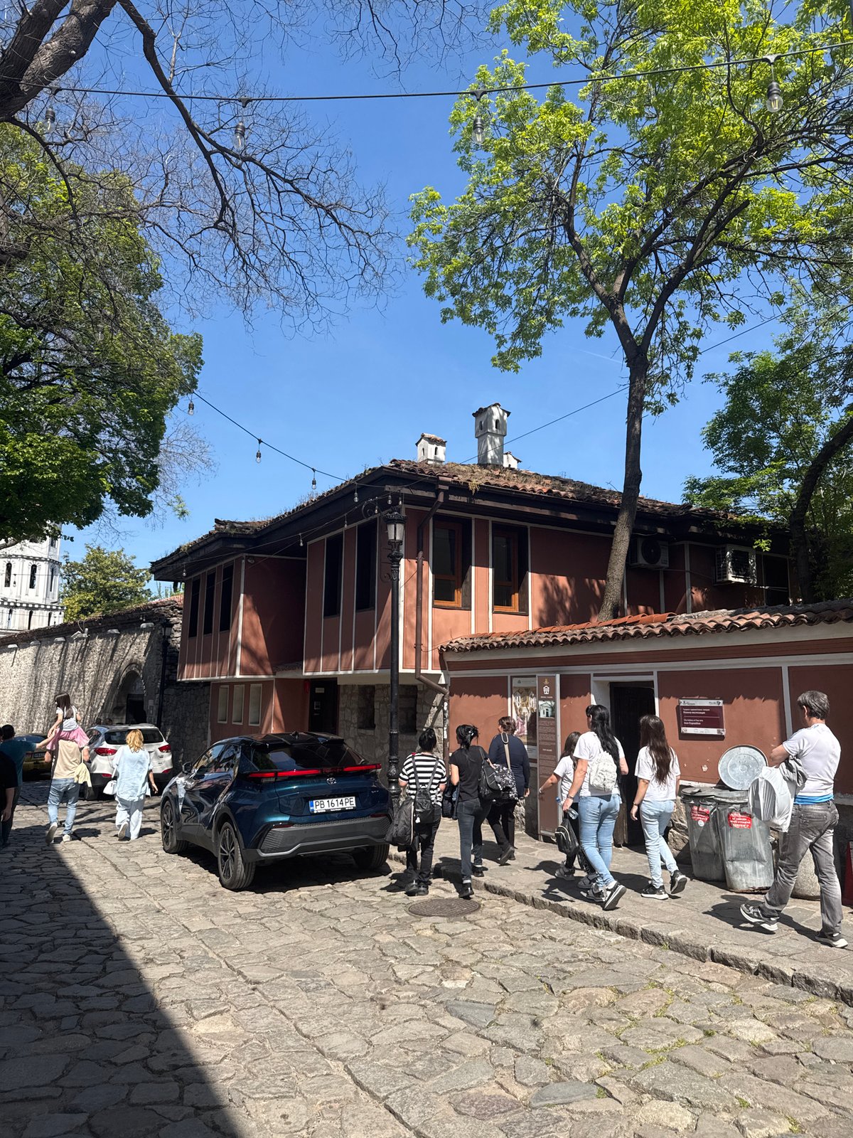 Street scene captured in Plovdiv showing terracotta building
