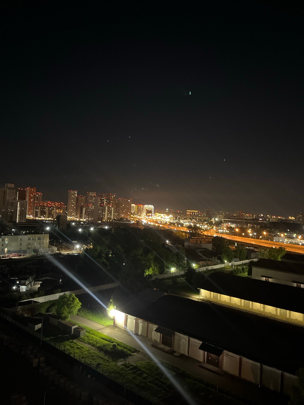 Moscow residential fringe at night, towers and construction zones