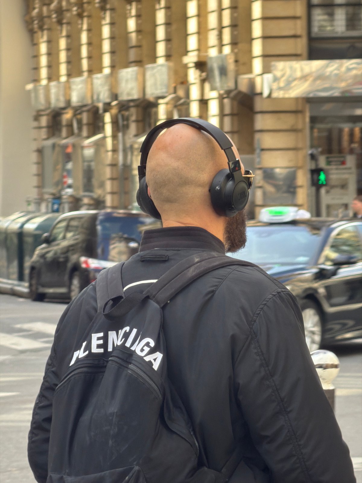 Afternoon street life documented across central Paris neighborhoods