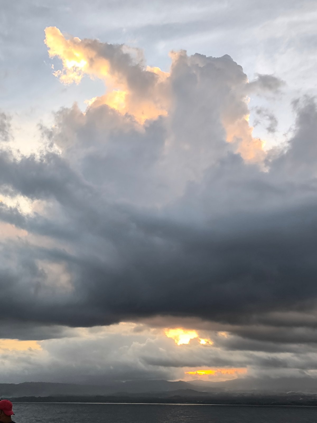 Dramatic clouds captured from MV Ocean 9 near Mount Agung