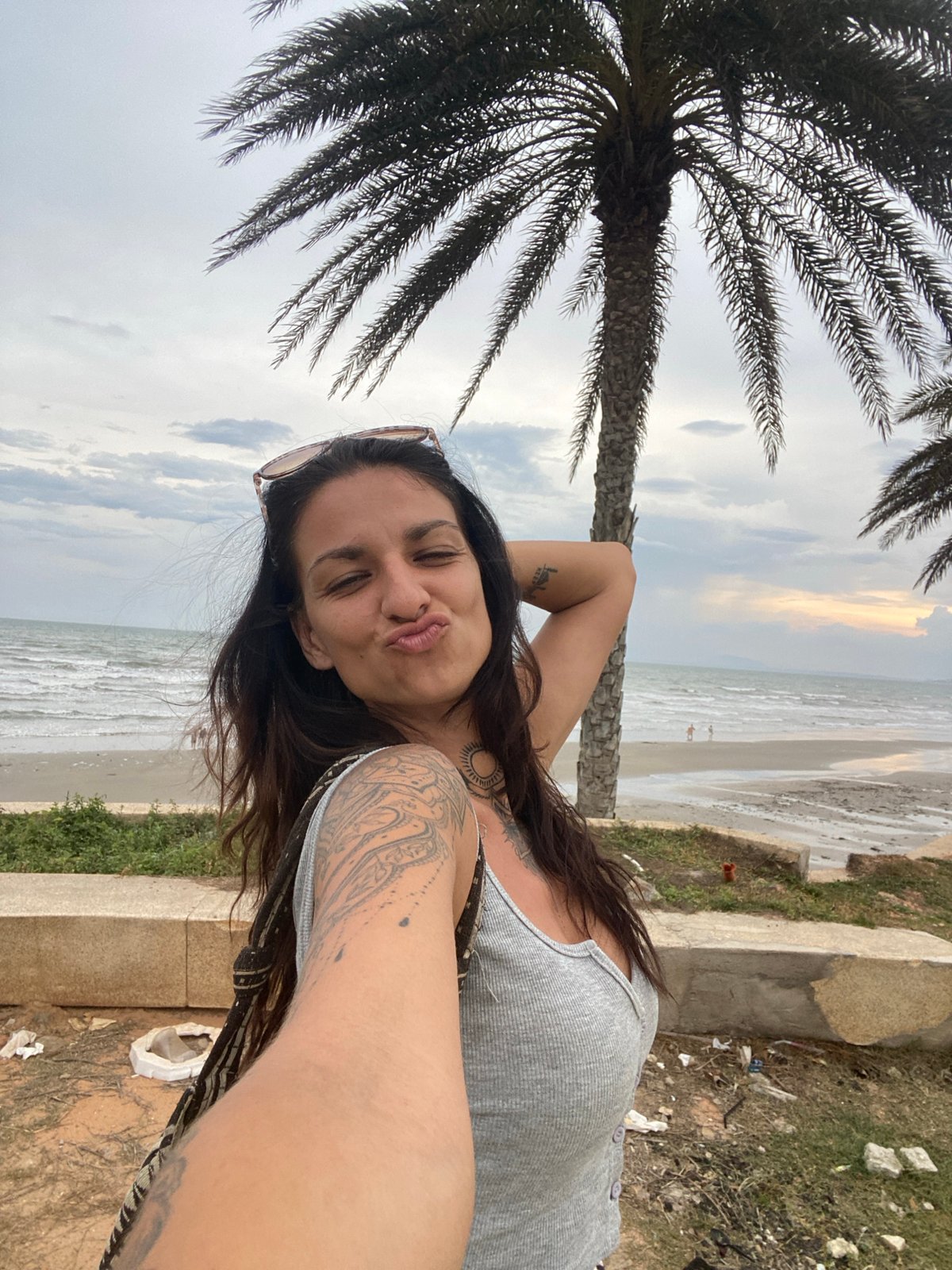 Selfies and street scenes along Mũi Né's beachfront promenade