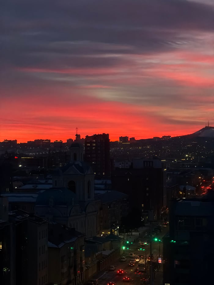 Dramatic sunrise or sunset colors captured over Krasnoyarsk