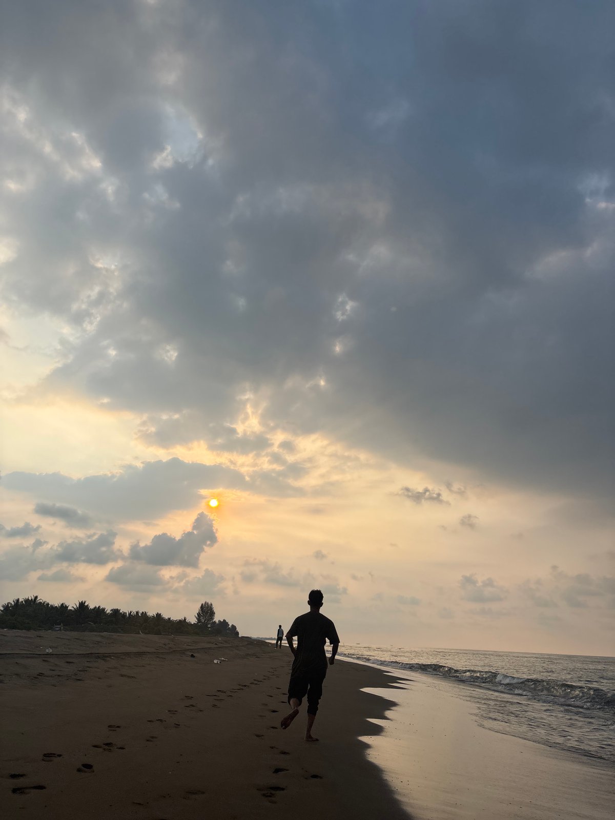 Sunset beach scene photographed in Angkleng Barat, Indonesia