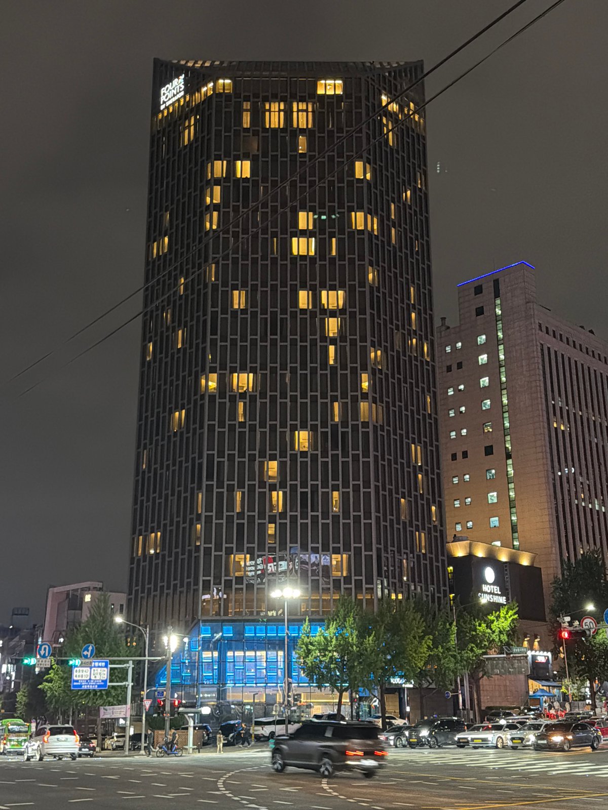 Nighttime street scene on a quiet Seoul block