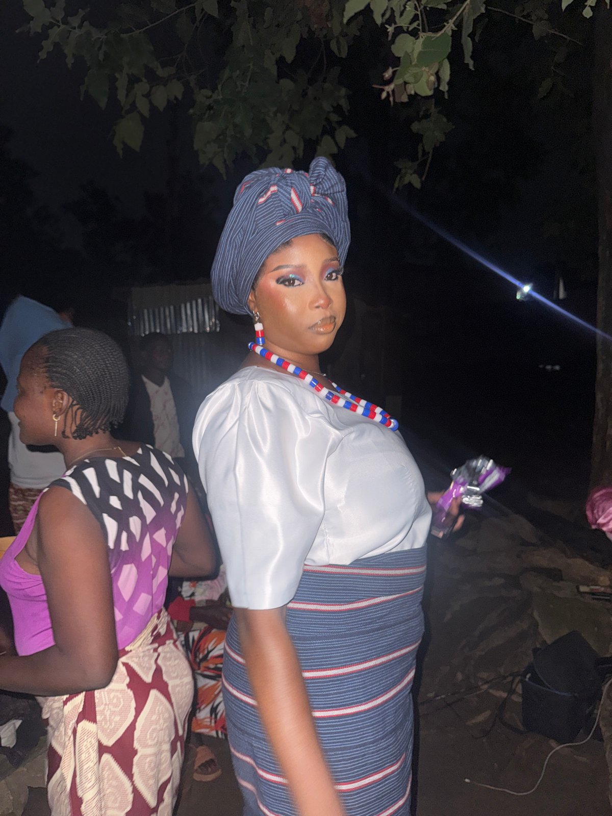Traditional nighttime gathering in Gura Top, Nigeria
