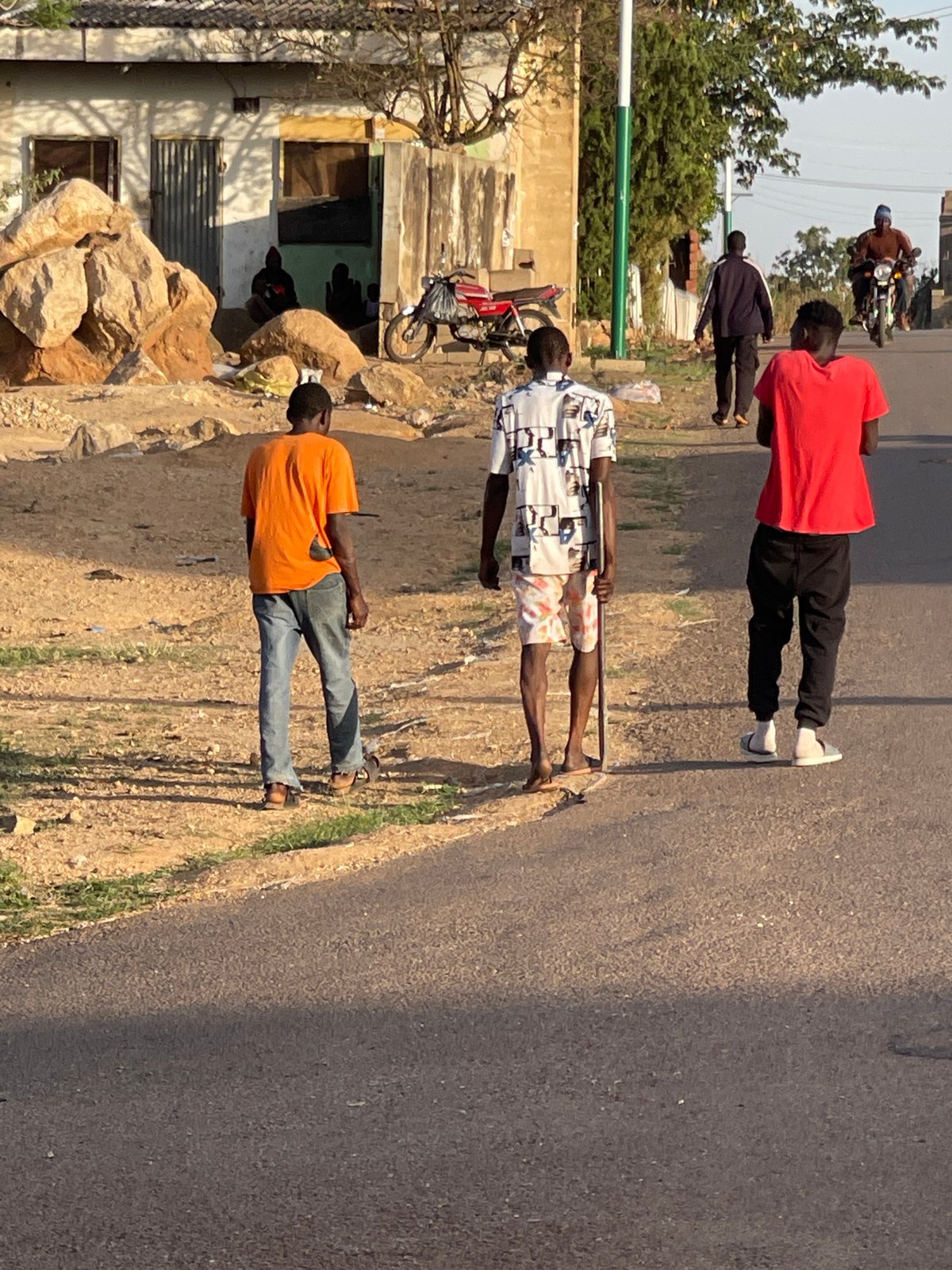 Everyday street life documented across Jos, Nigeria neighborhoods