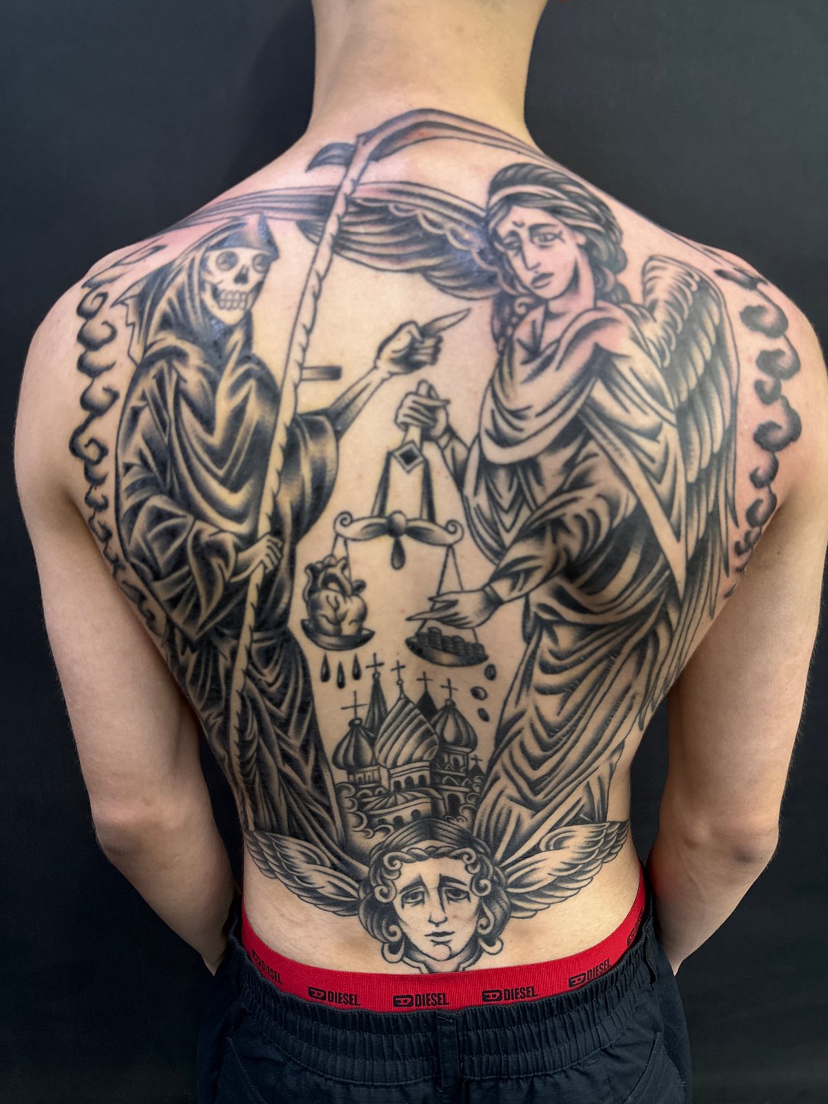 Elaborate grim reaper tattoo spotted in Moscow