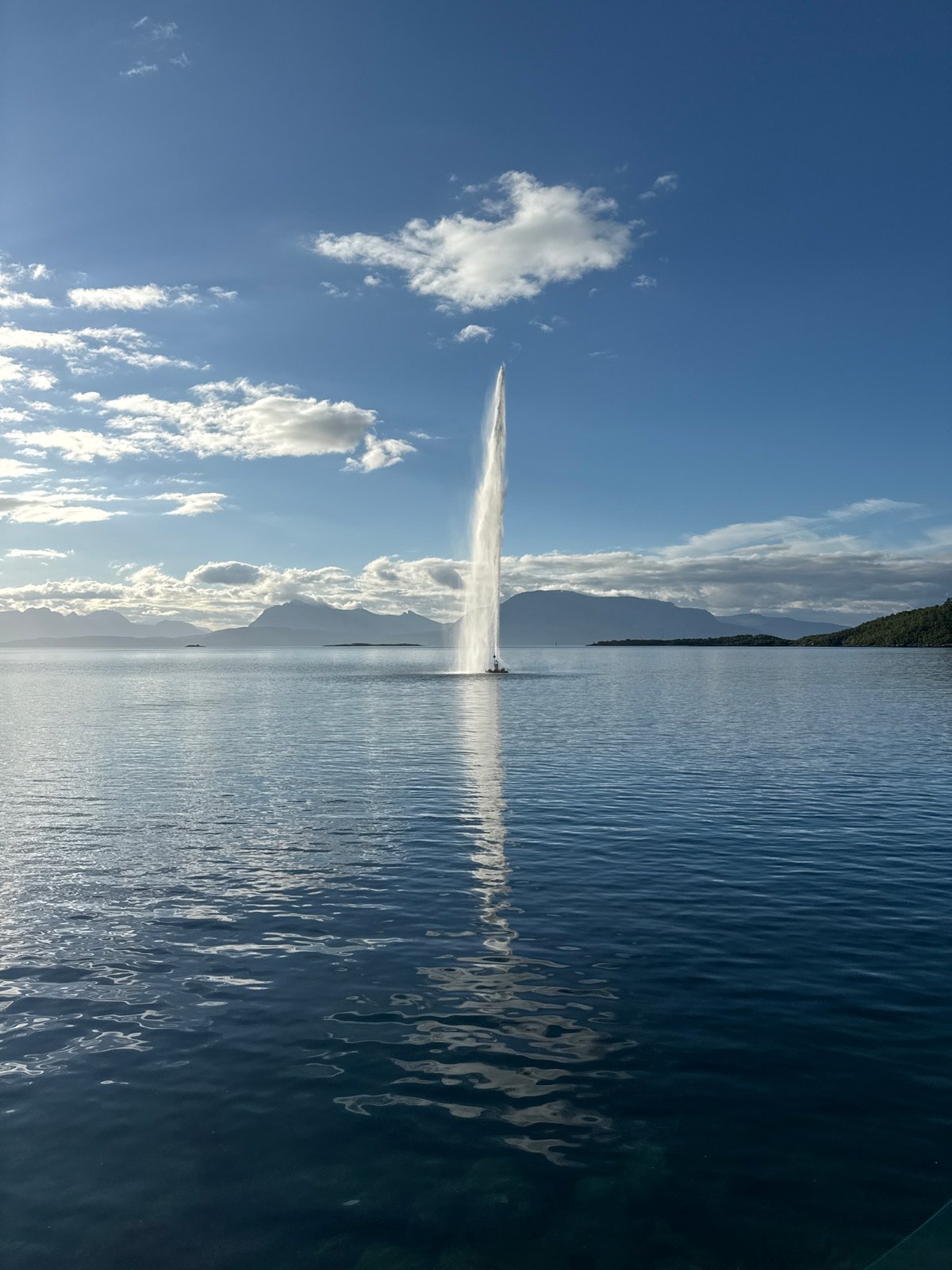 Harstad harbor fountain and waterfront, with indoor selfies nearby