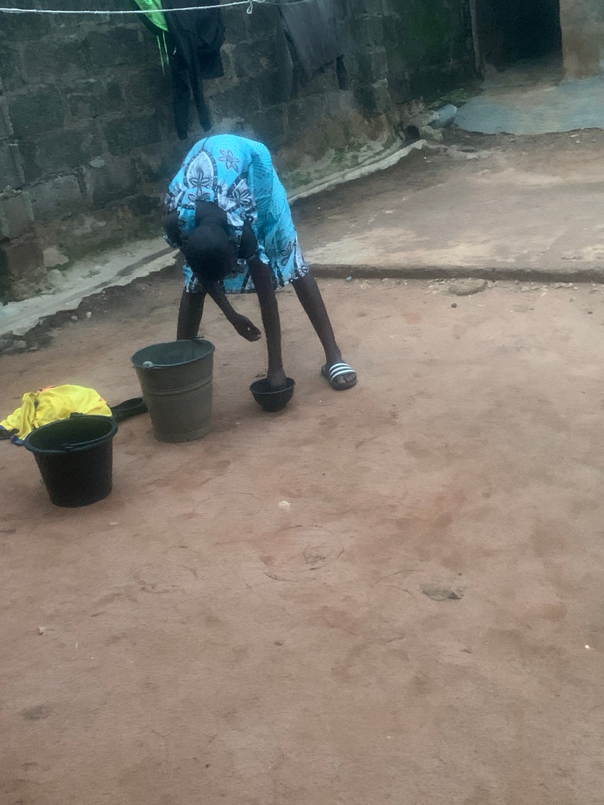 Portraits and backyard chores on a Shagamu afternoon