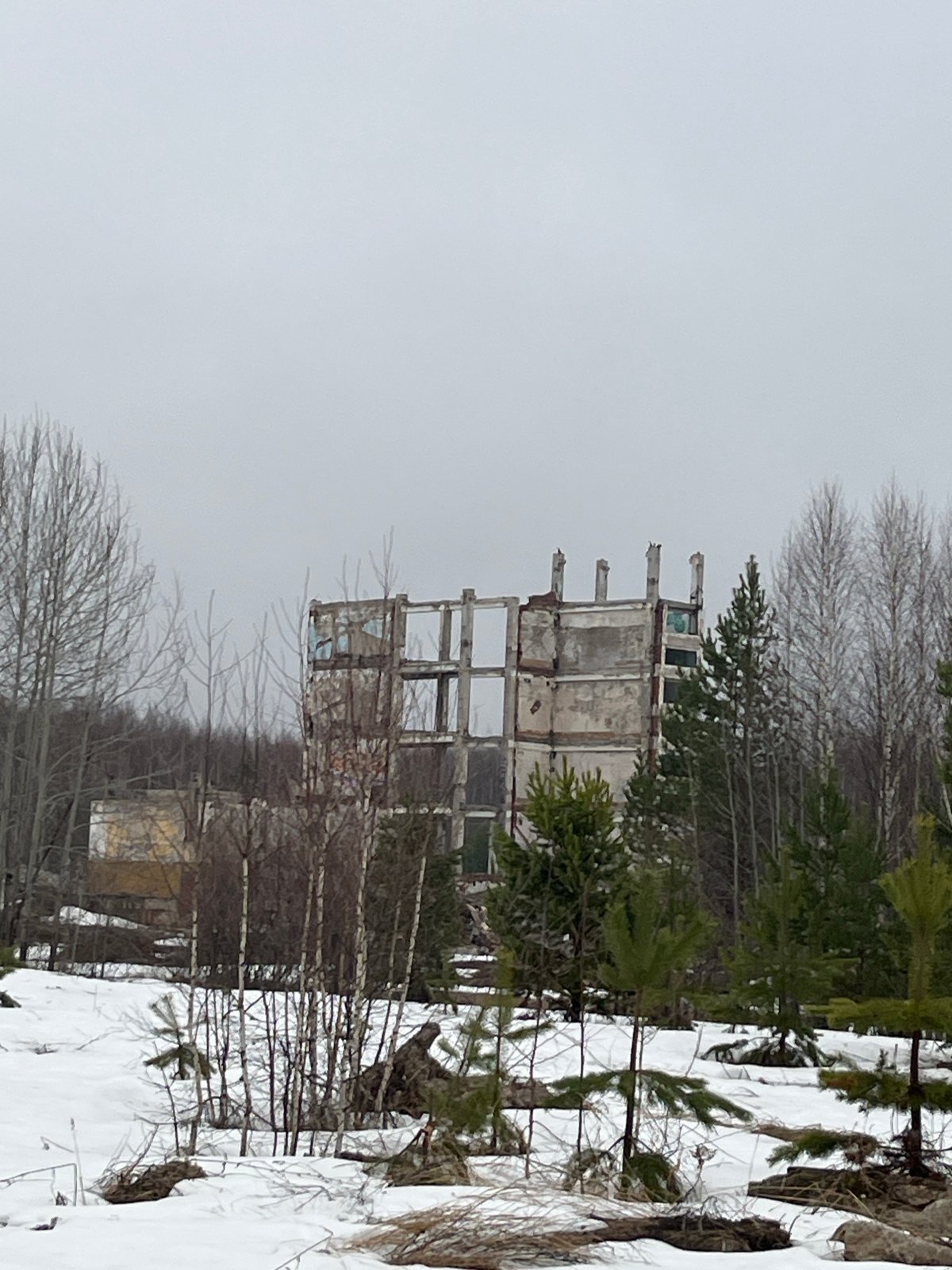 Winter documentation reveals abandoned structures in Марковский, Russia