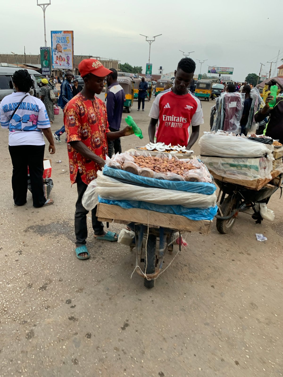 Daily marketplace commerce observed in Nigerian cities