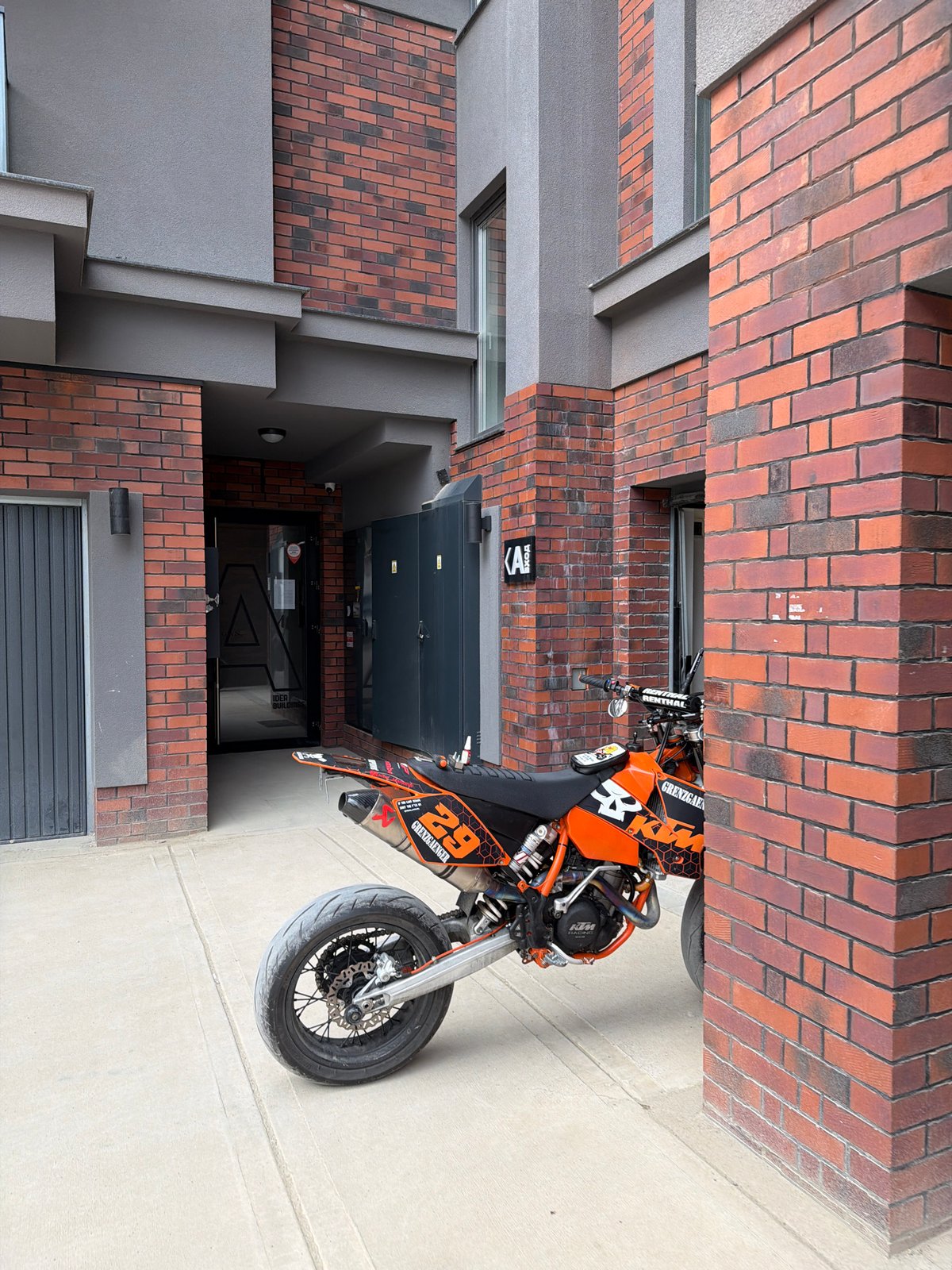 KTM motorcycle parked outside modern building in Sofia