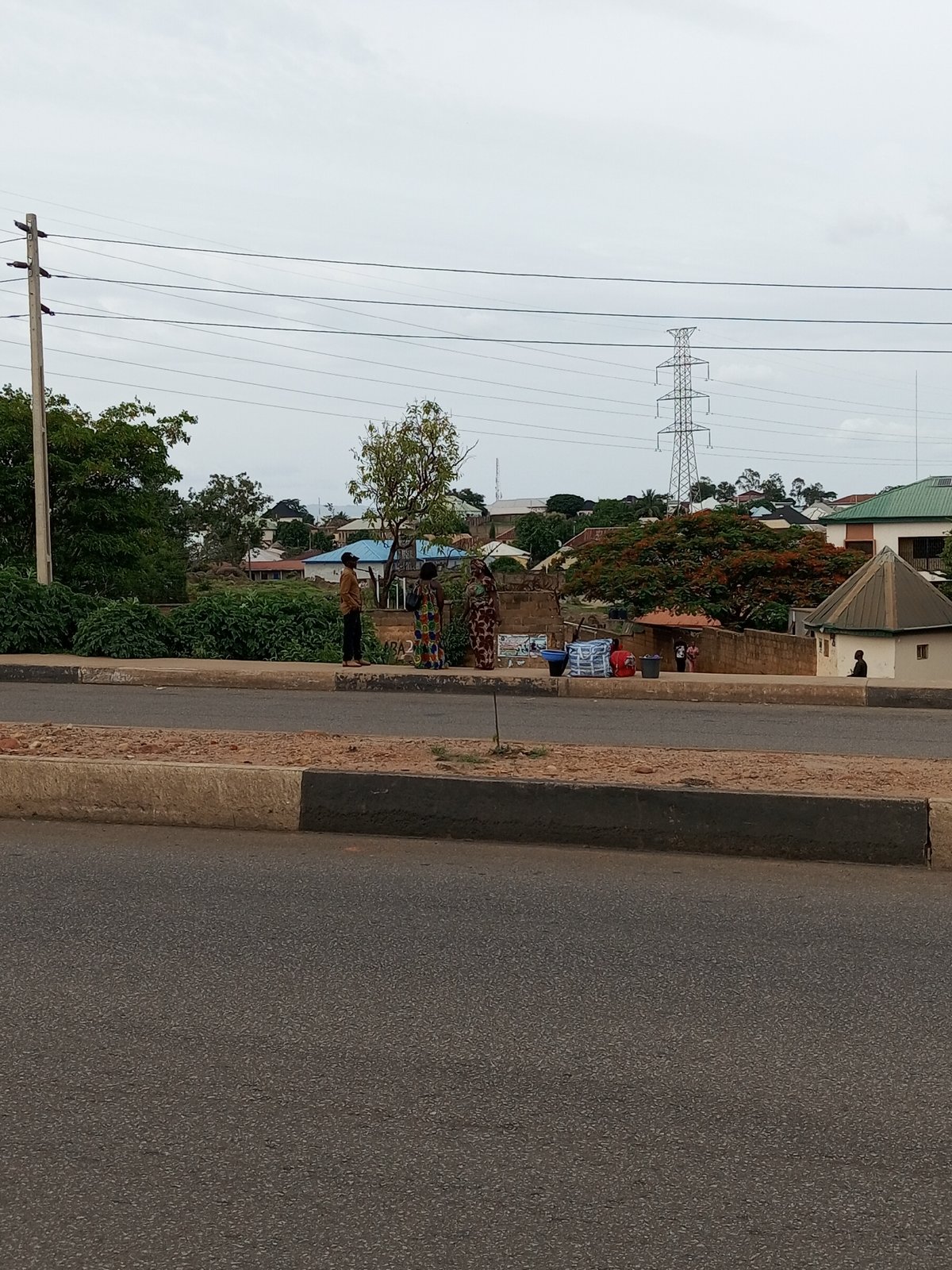 Street-level scenes from Gura Top, Nigeria on a cloudy afternoon