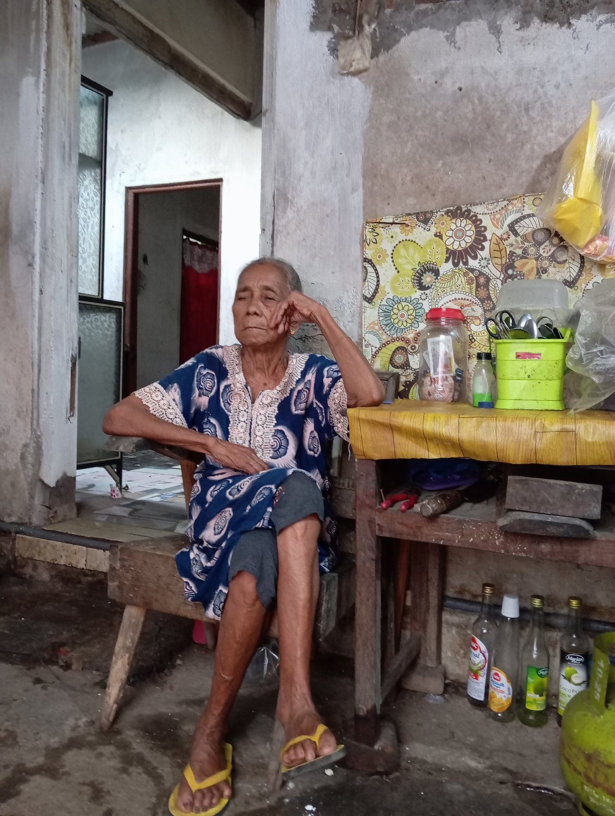 Quiet moments captured in Baron: elderly woman resting, animals, pathways