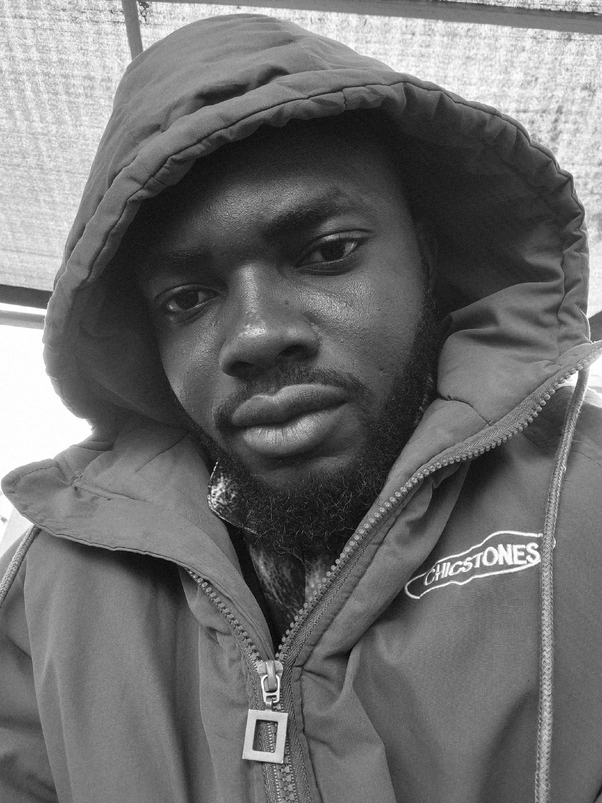 Man photographed with cat at Nigerian gas station