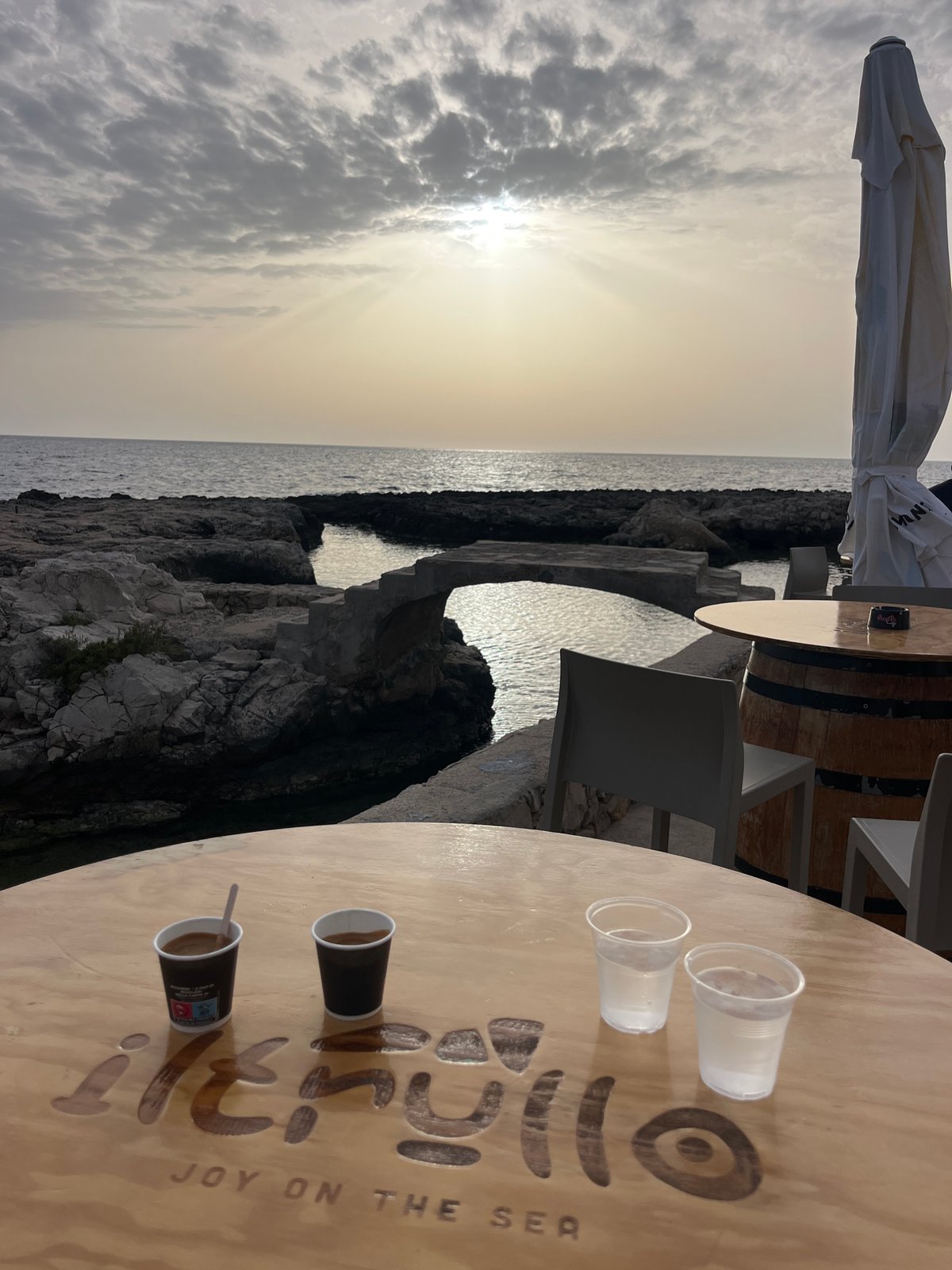 Hazy afternoon captured at seaside cafe in Nardò, Italy