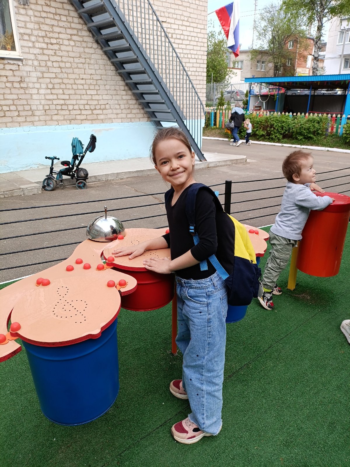 Spring afternoon moments captured across Chaikovsky, Russia playgrounds and buildings