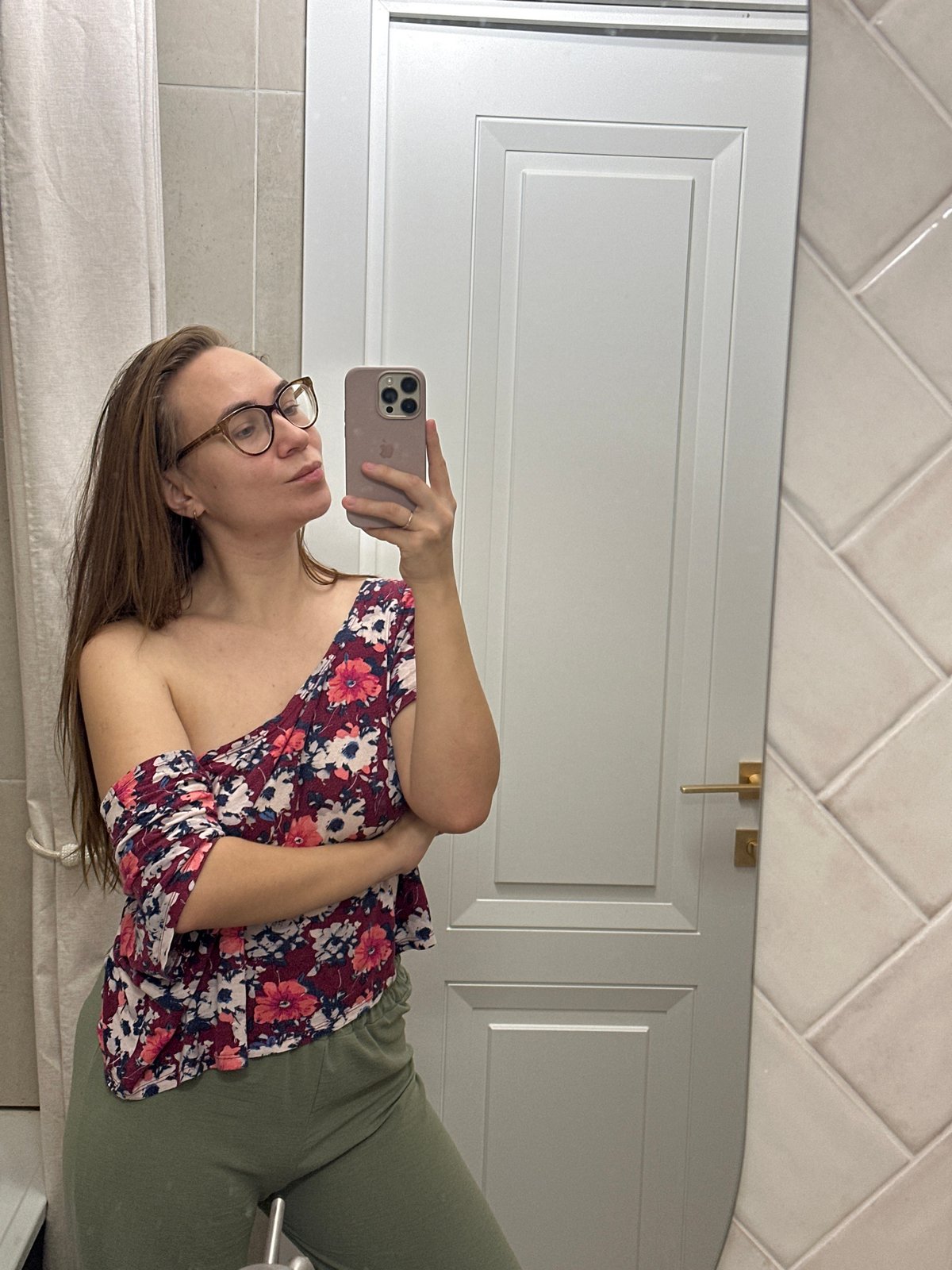 Woman documents flower delivery with selfies in Kharnavy