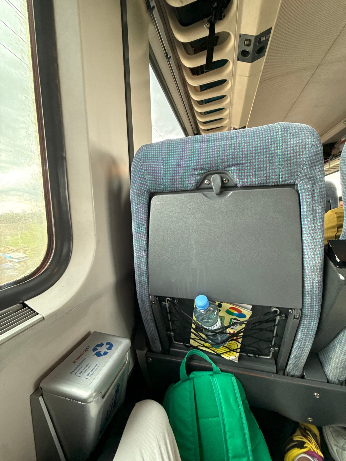 Passenger documents public transport interior in Himberg, Austria