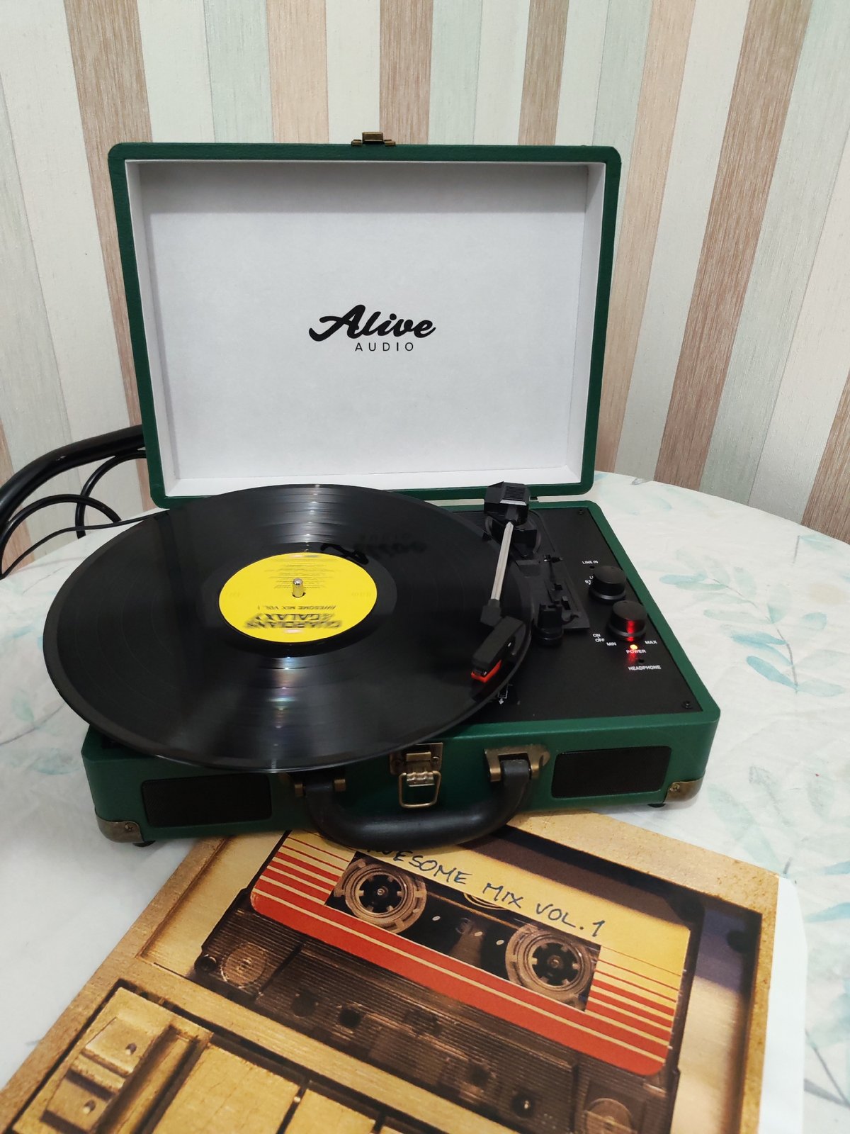 Vintage portable record player operates in Izhevsk home