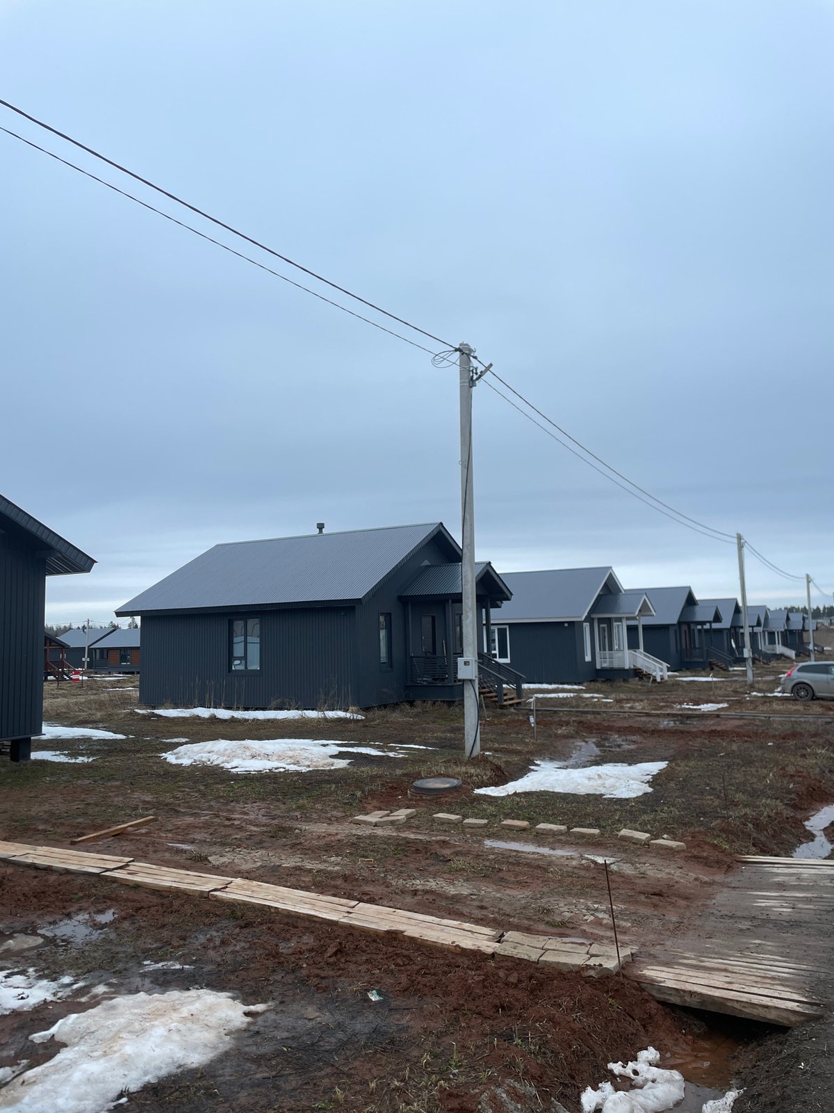 Spring day documented in Russian village with new construction