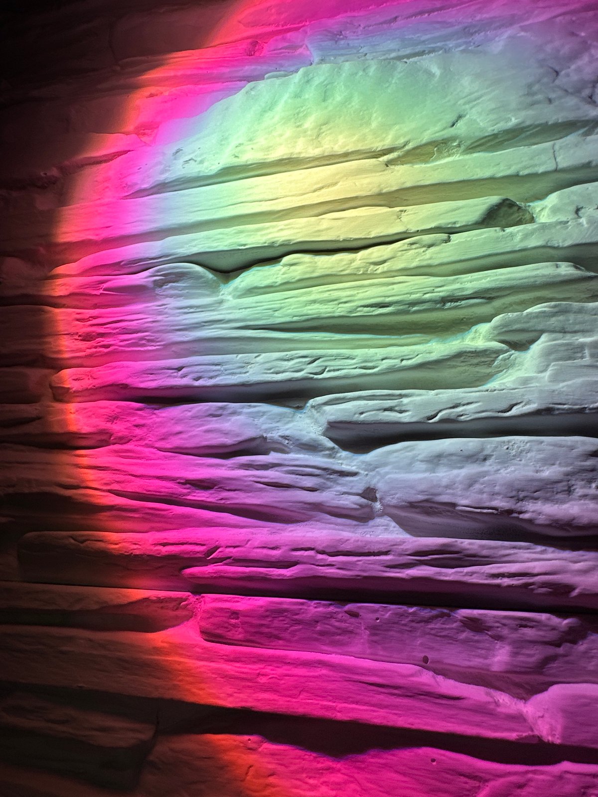 Textured surfaces captured under dynamic colored lighting display