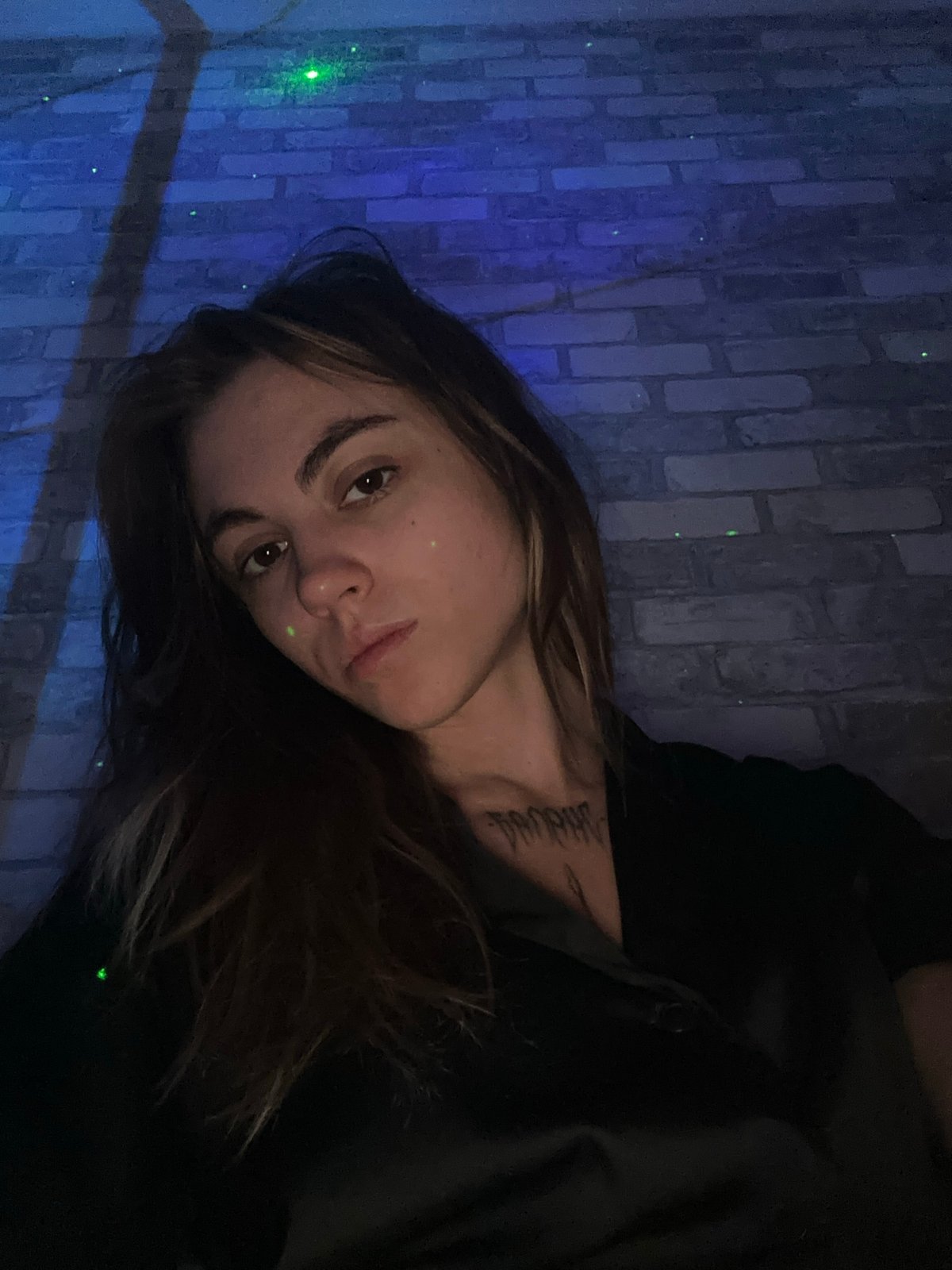 Woman photographed in various Moscow indoor and balcony settings