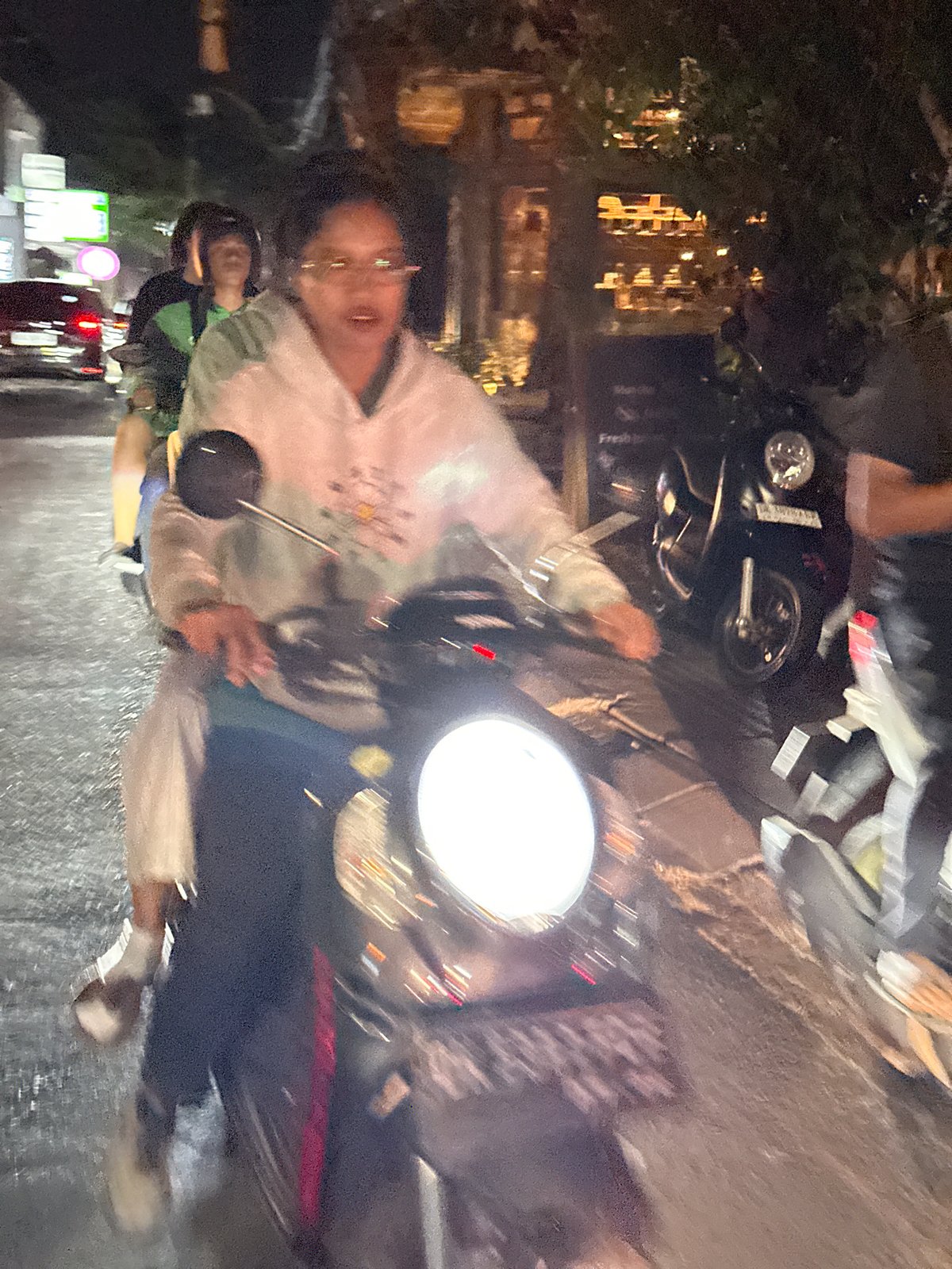 North Kuta nights: scooters, fireworks, and a cherry blossom café