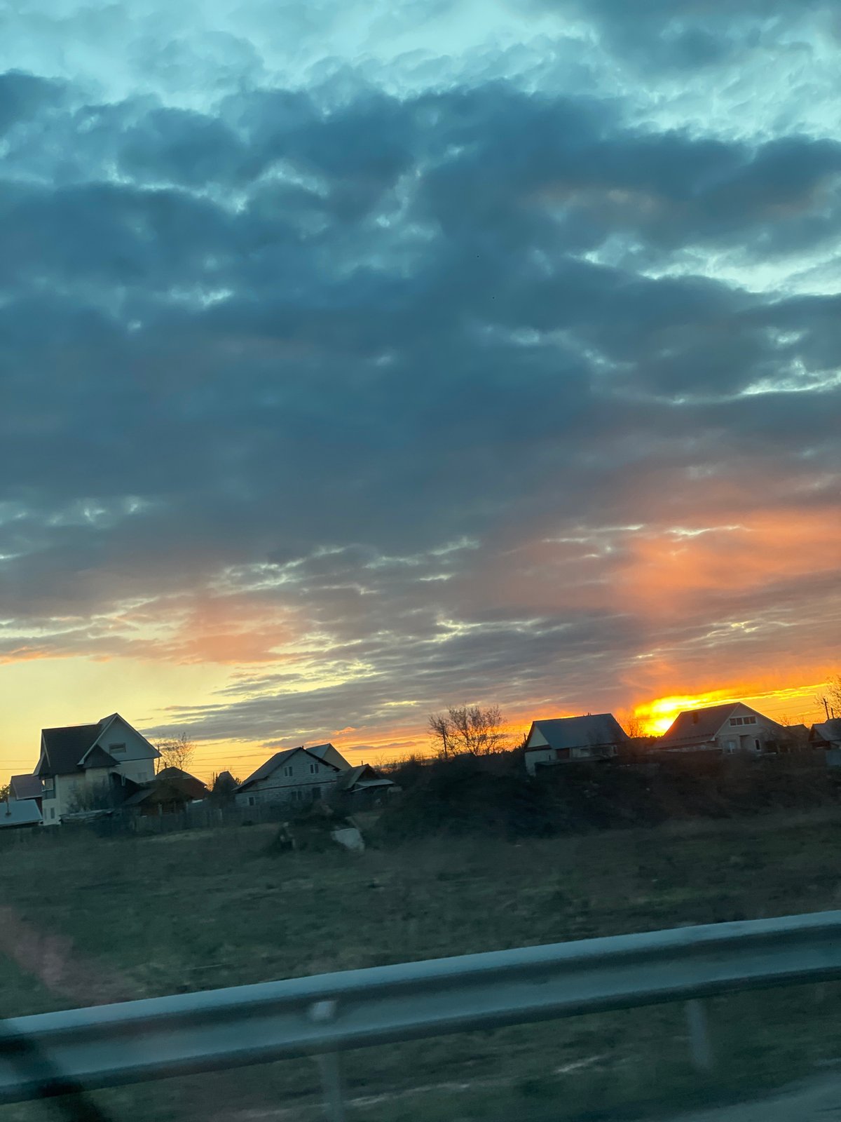 Dramatic sunset captured over rural Malaya Ven'ya, Russia