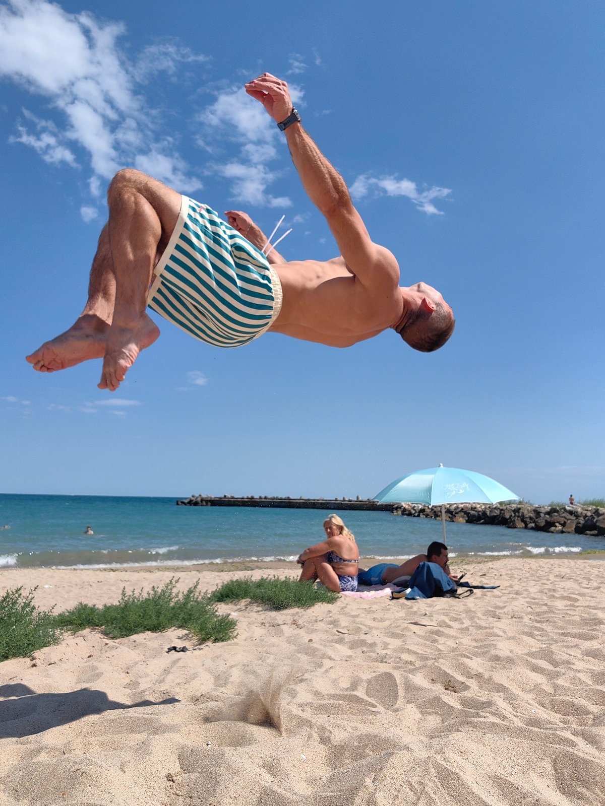 Backflips on a packed Black Sea beach in Varna