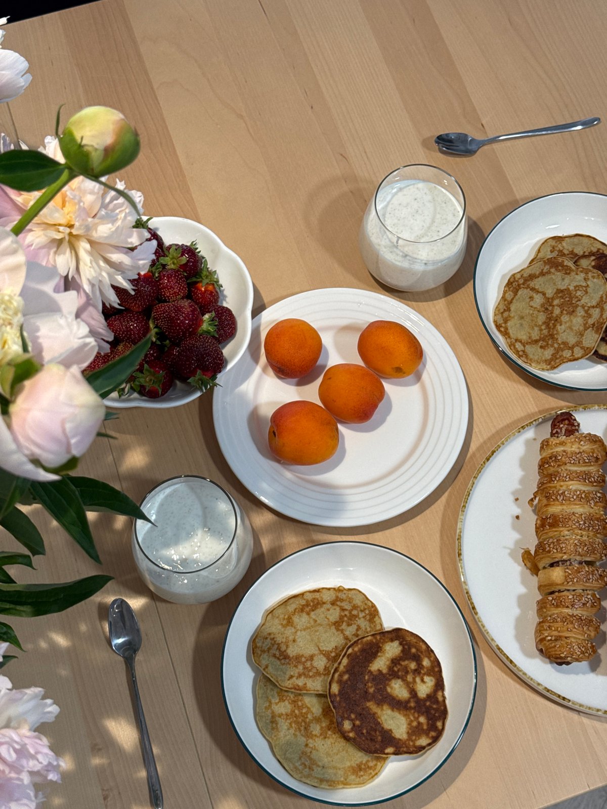 Styled home breakfast with peonies and fresh fruit, Izhevsk