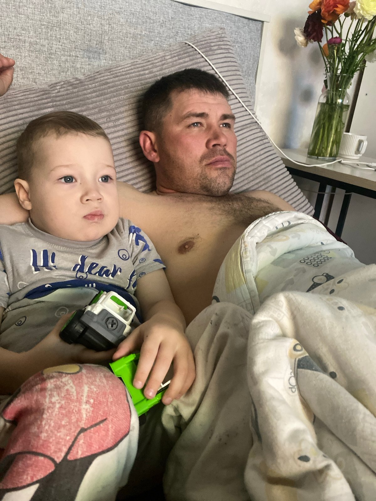 Father, child share quiet moments at Sochi home