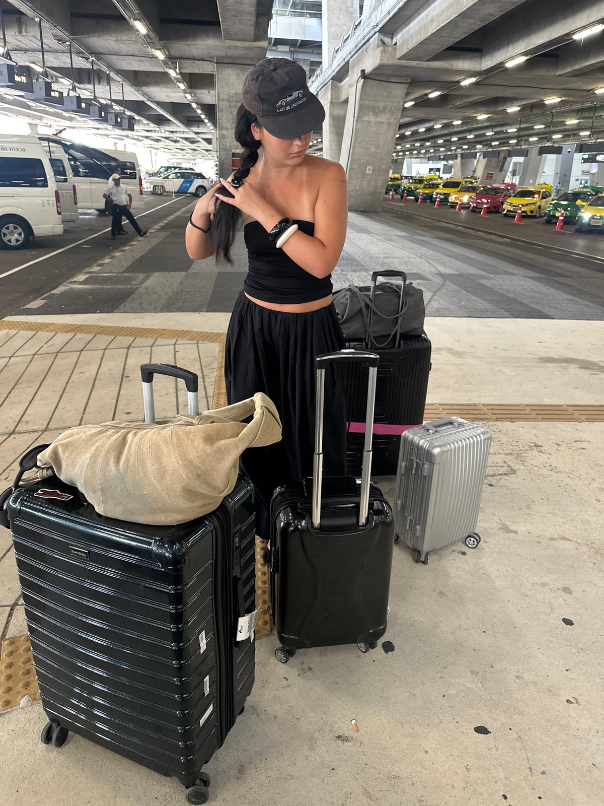 Woman with luggage spotted at Thailand transportation hub