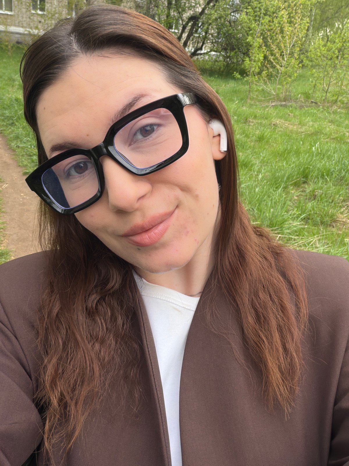 Woman takes selfies in different outfits in Chaikovsky, Russia
