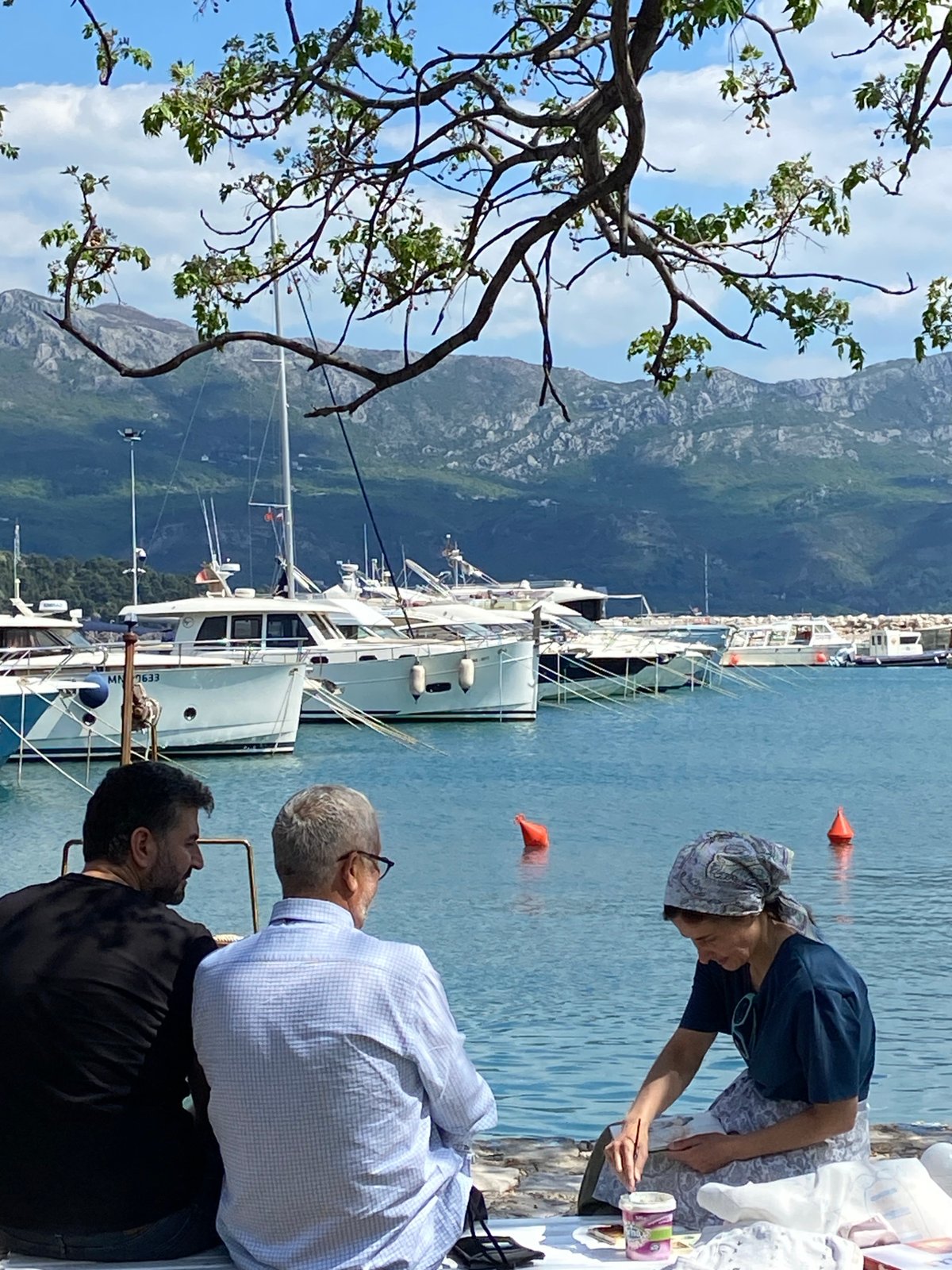 Casual waterfront scenes captured at Budva marina, Montenegro