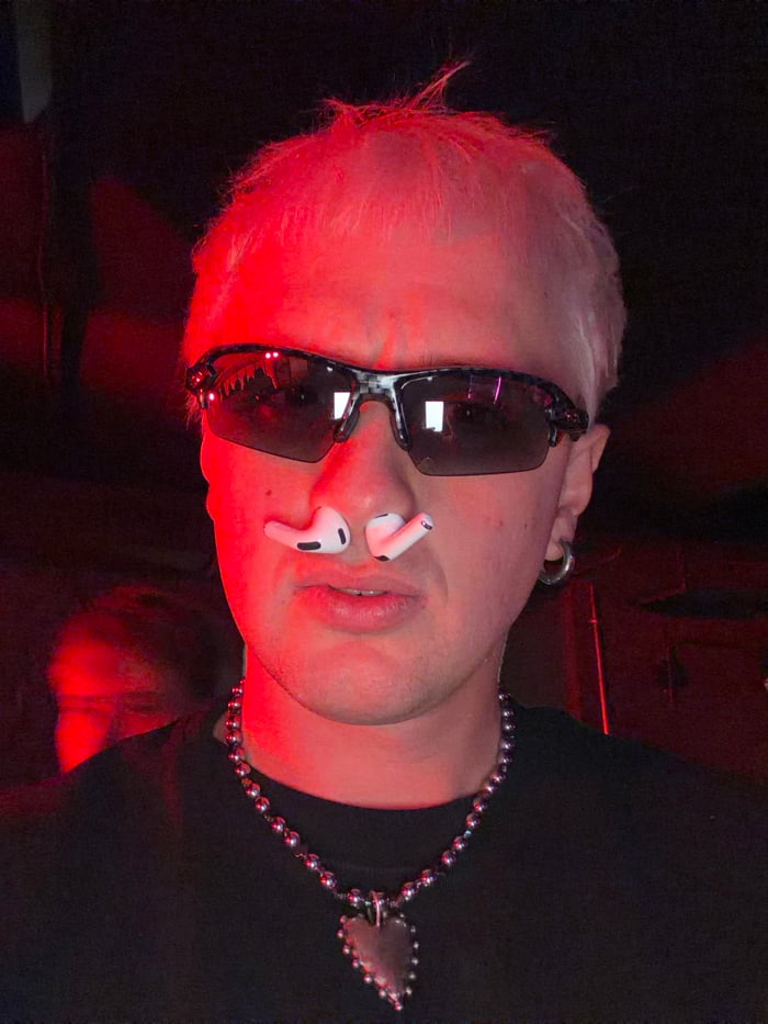 Moscow DJ Event Features Red-Lit Venue, Dancing Crowds