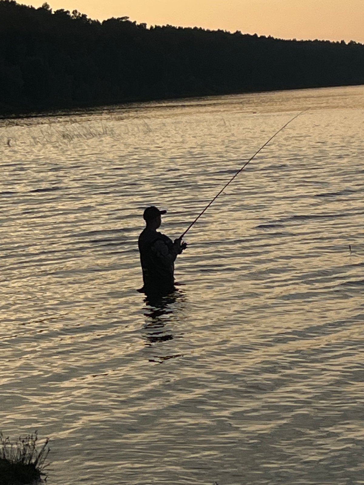 Evening by the Kama River: fishing, selfies, and a sunset shoreline