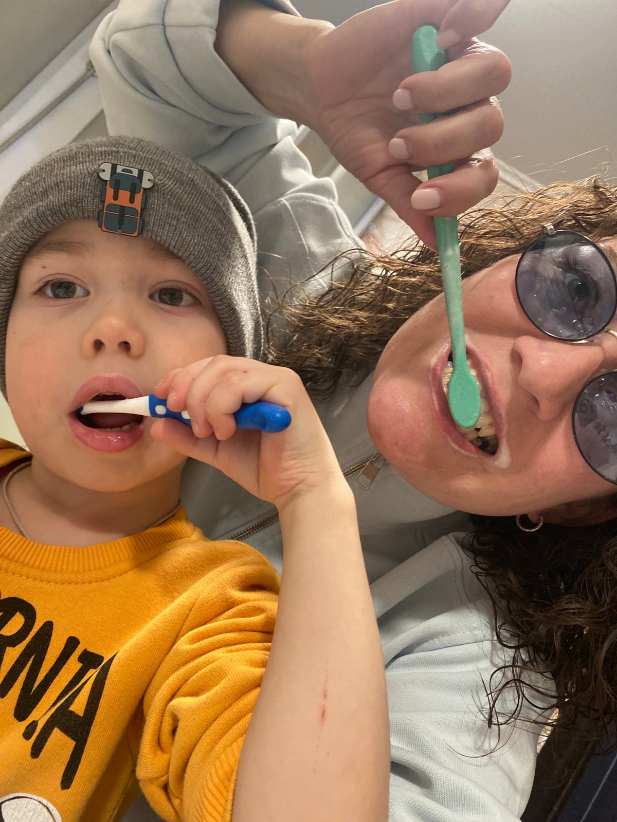 Mother and child share morning tooth-brushing routine in Russia
