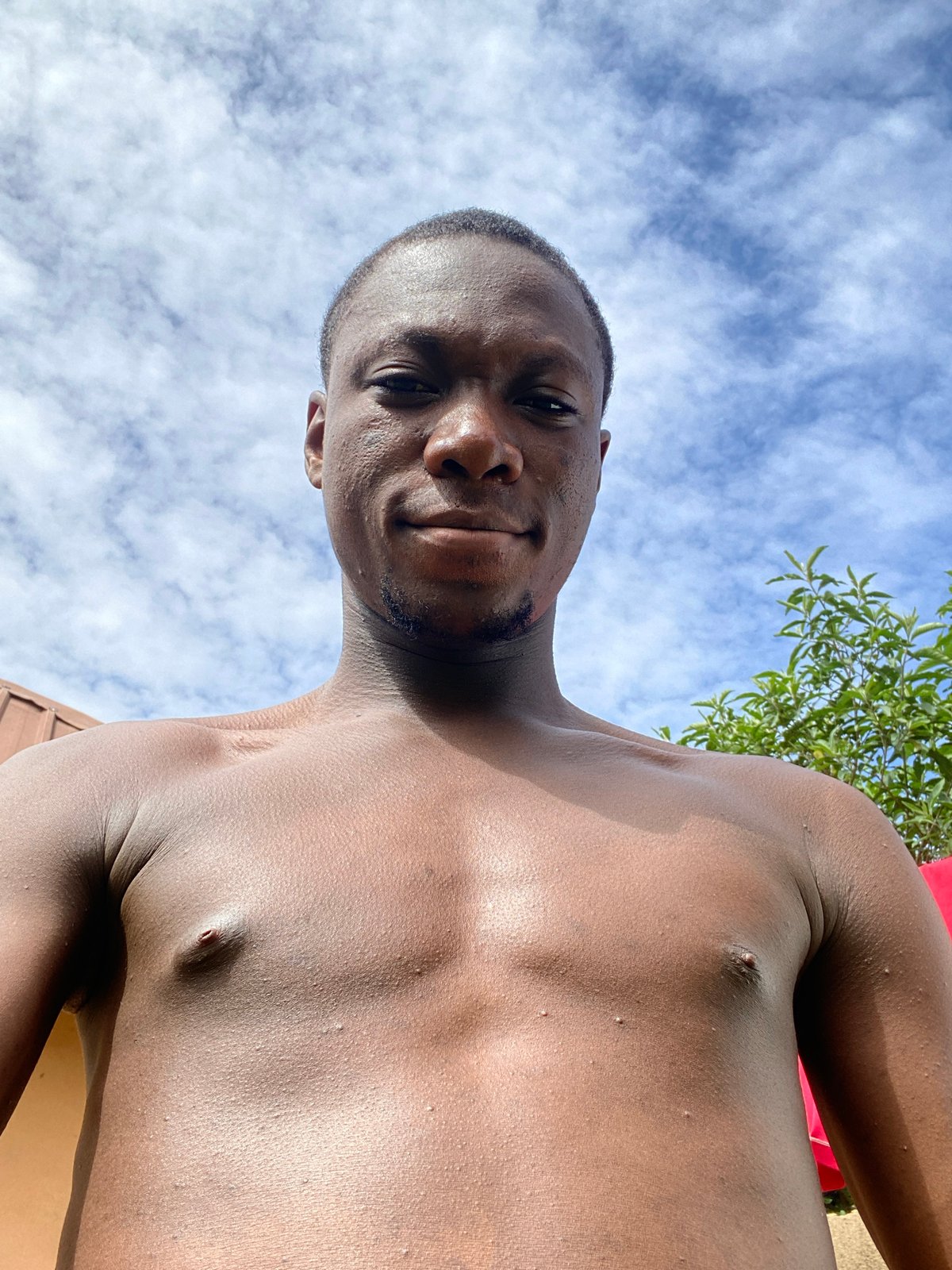 Low-angle portraits and sky-gazing in Bukuru, Nigeria