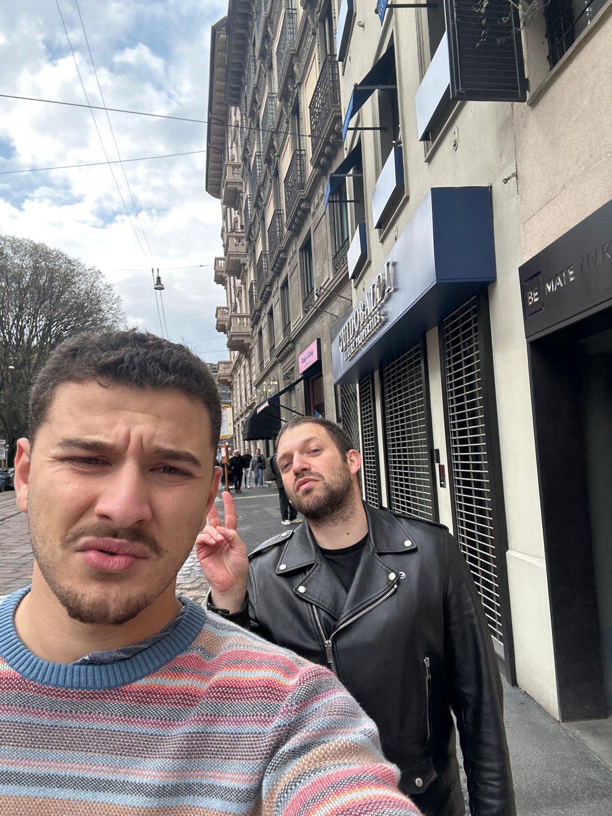 Two men spend casual afternoon in central Milan