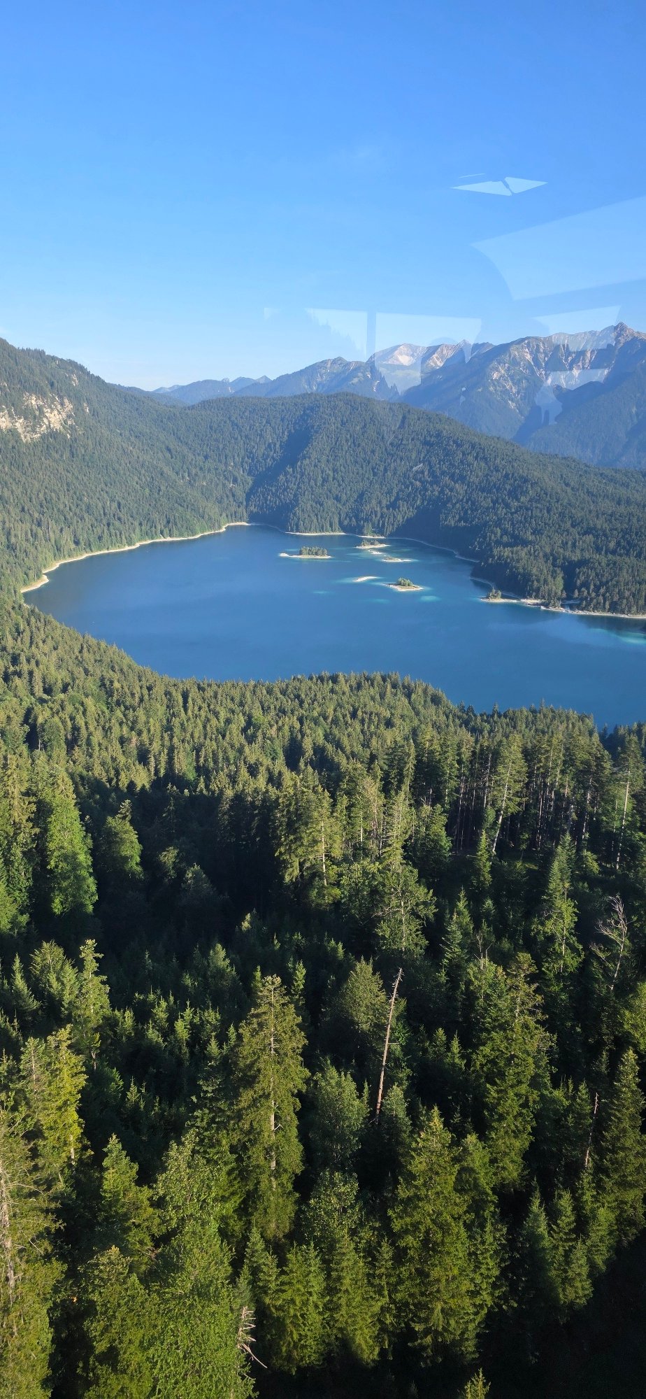 Eibsee from above, Zugspitze reflected in alpine blue
