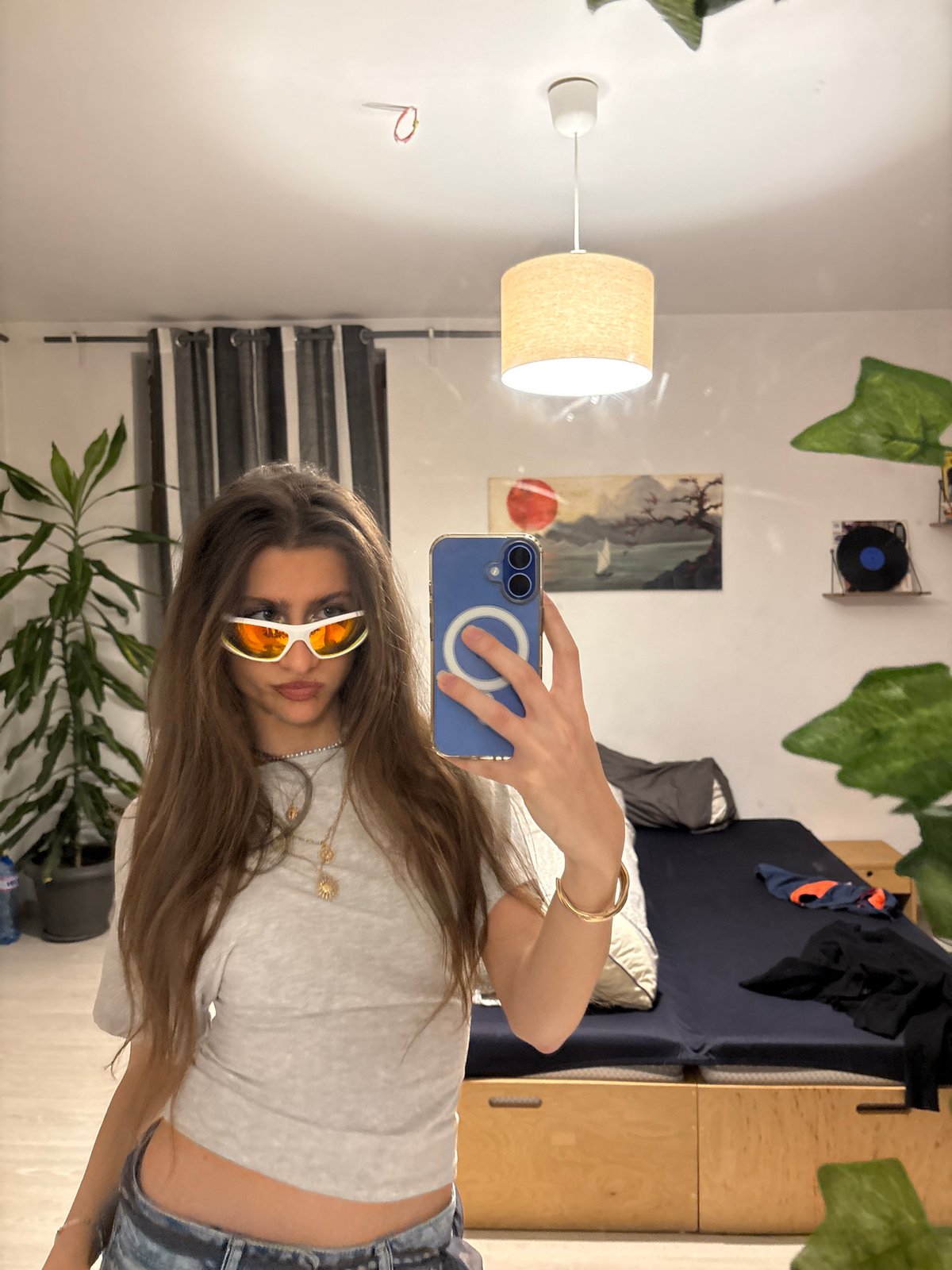 Woman takes selfies in bedroom in Sofia