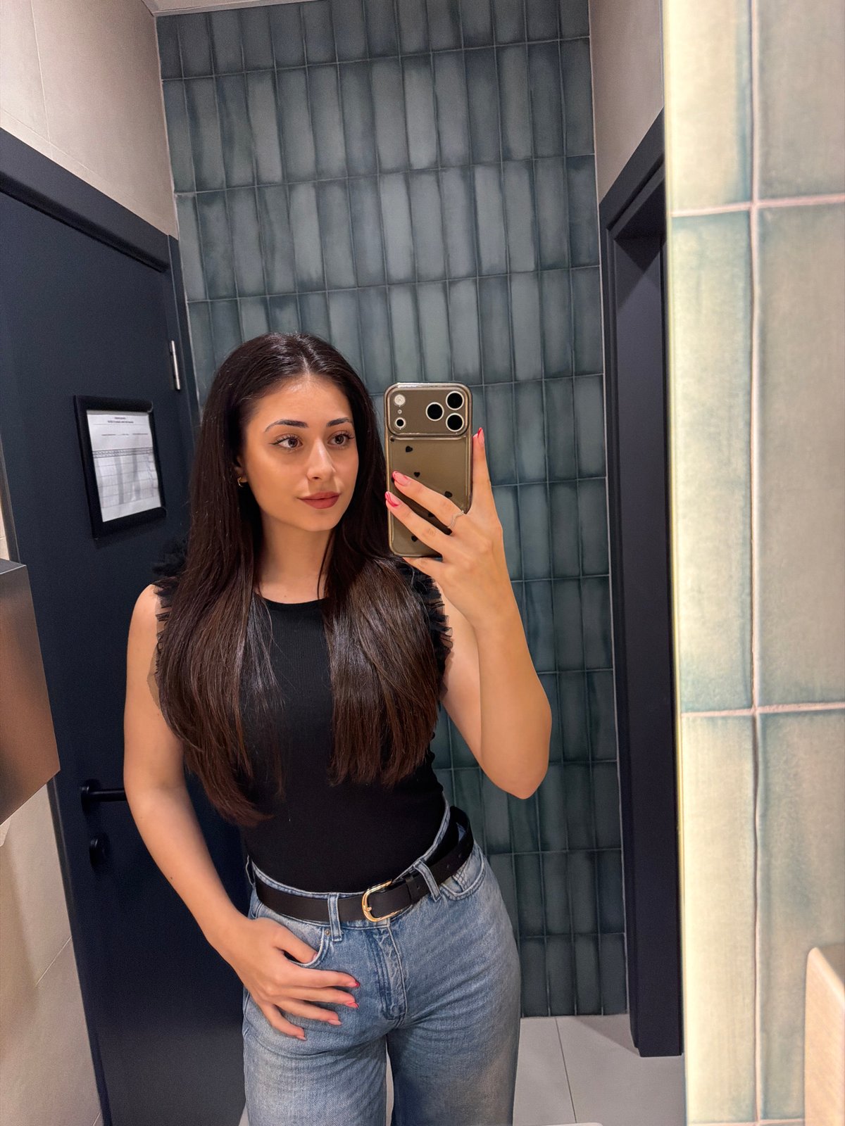 Woman Takes Bathroom Selfie in Sofia