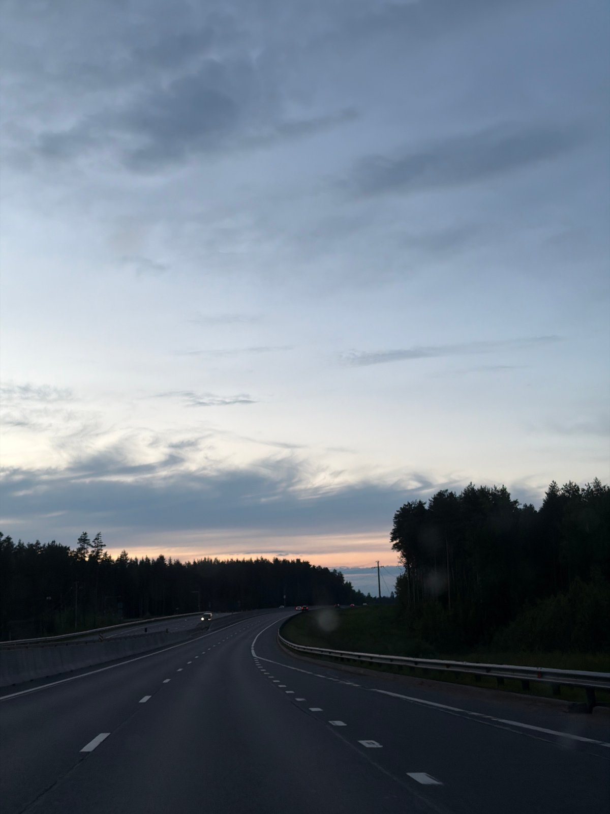 Highway scene captured at dusk in Vaskelovo, Russia