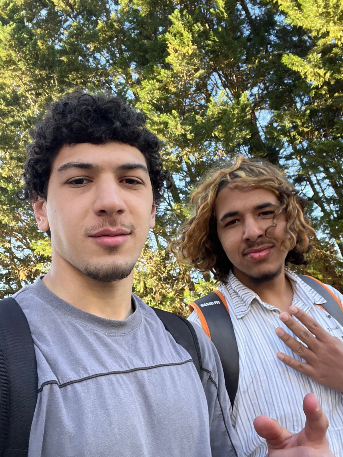 Two friends take selfies outdoors in Strasbourg