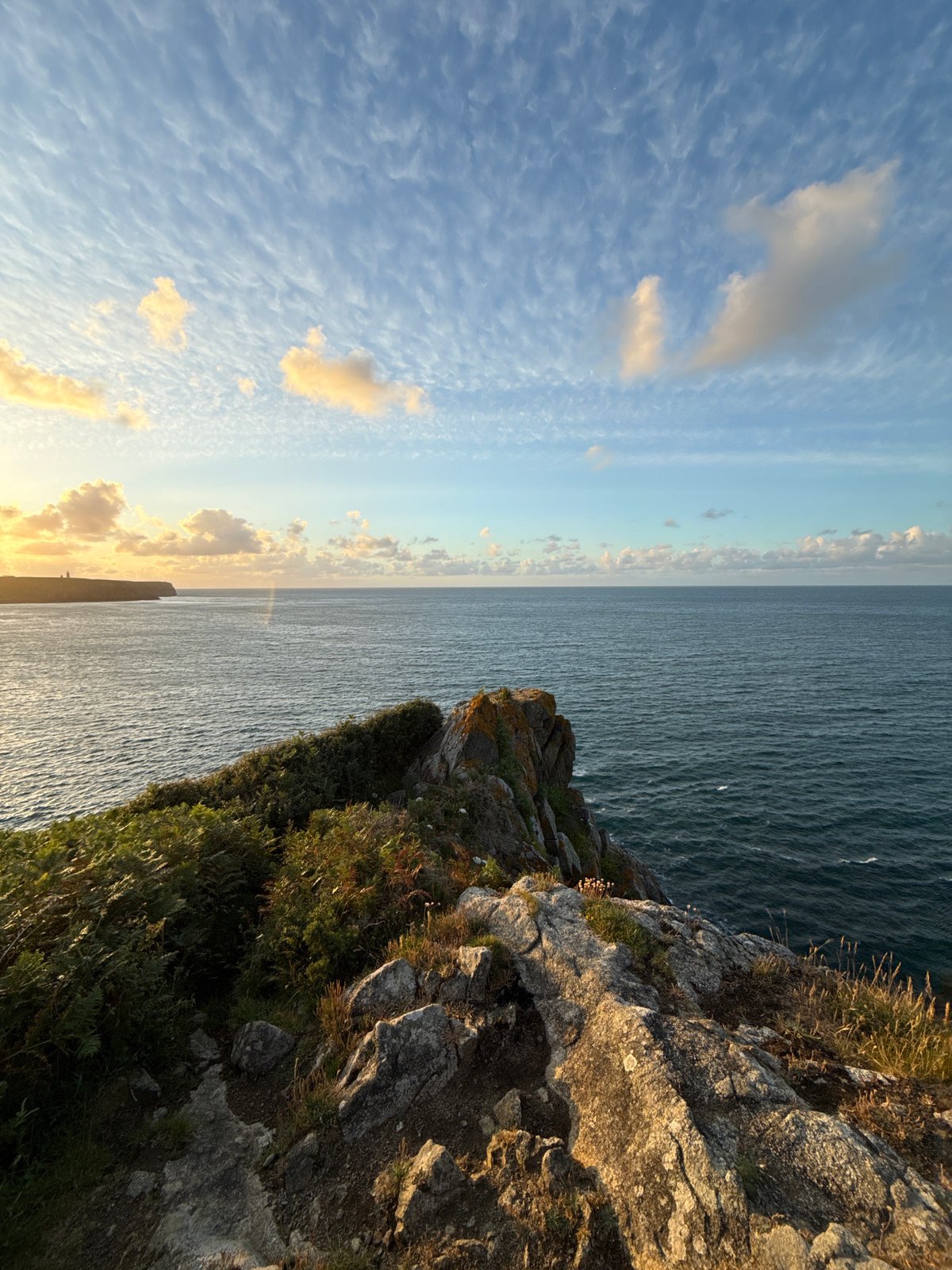 Sunset documented along dramatic Brittany coastline near Plévenon
