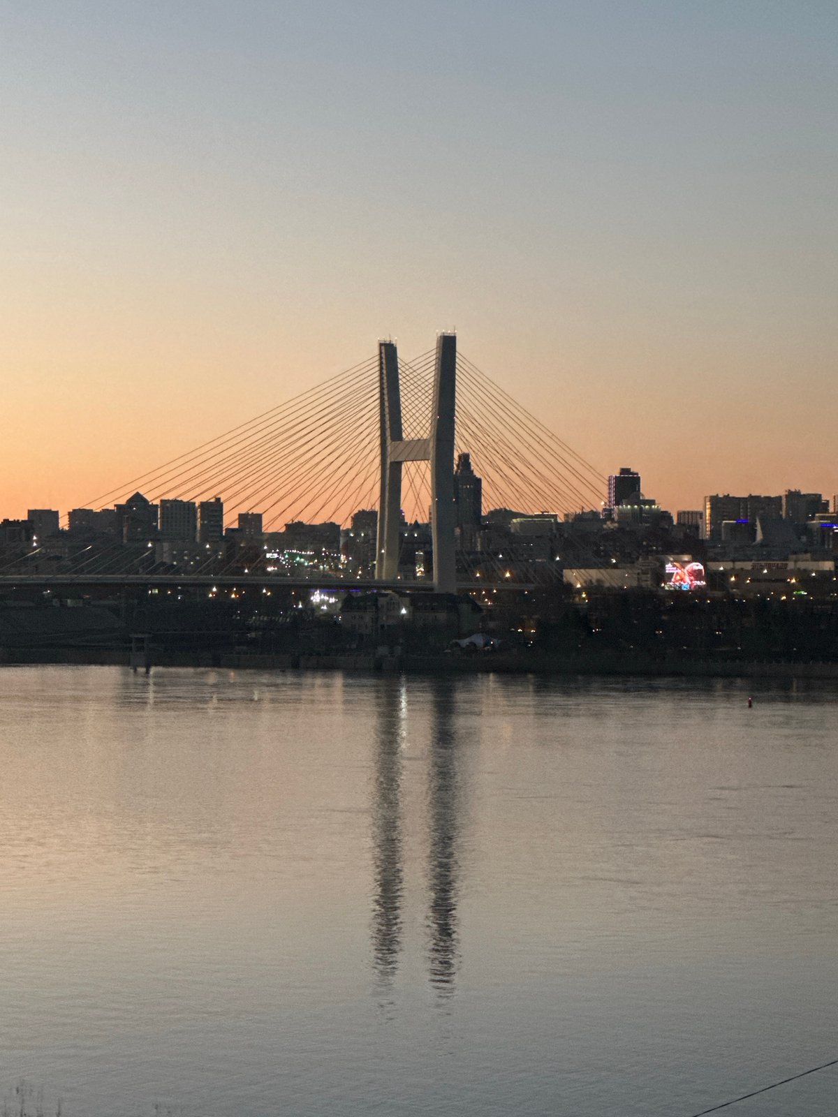 Evening views captured of Novosibirsk bridge at dusk